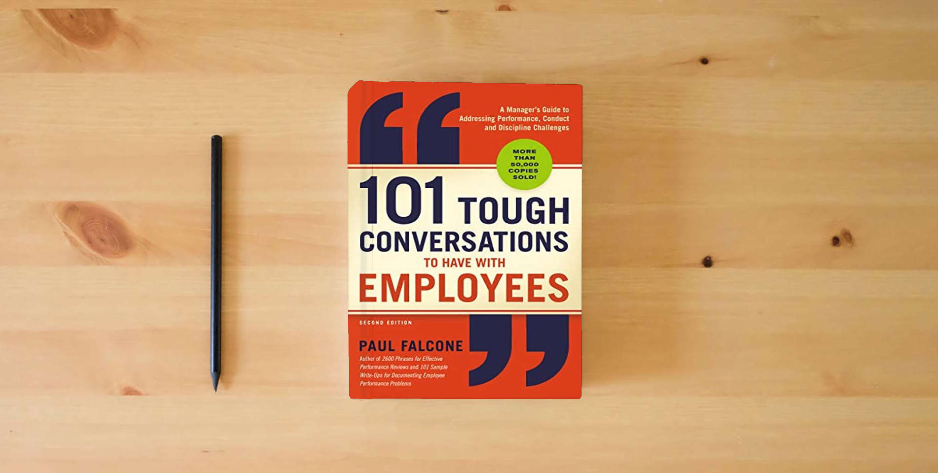 The book 101 Tough Conversations to Have with Employees: A Manager's Guide to Addressing Performance, Conduct, and Discipline Challenges is on the table