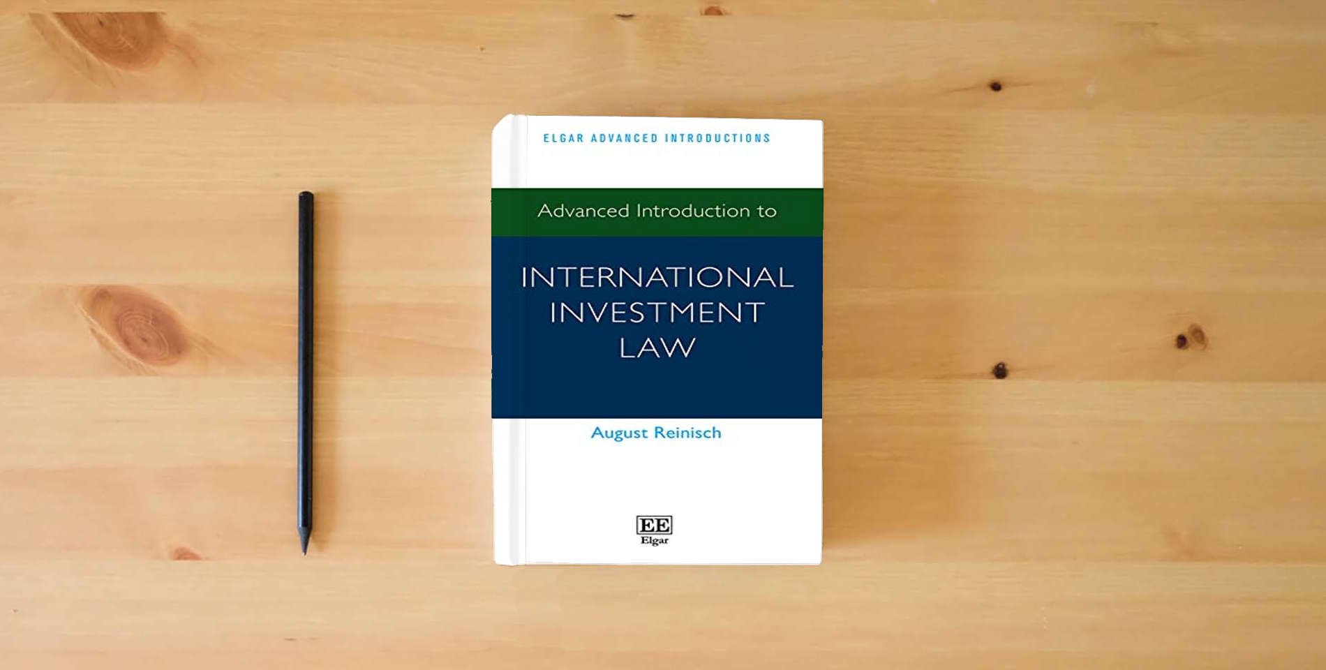 The book Advanced Introduction to International Investment Law (Elgar Advanced Introductions series) is on the table