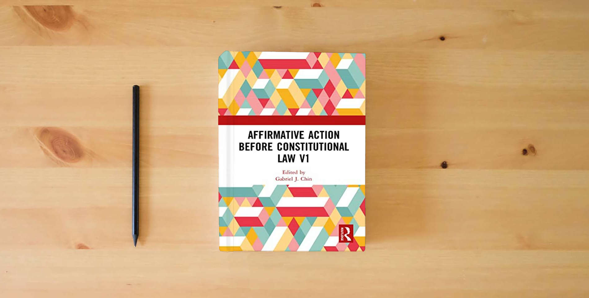 The book Affirmative Action Before Constitutional Law, 1964-1997 Vol.1-3(Cont.in Constitutional Law) is on the table