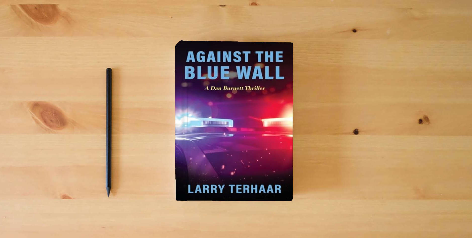 The book AGAINST THE BLUE WALL: A Dan Burnett Thriller is on the table