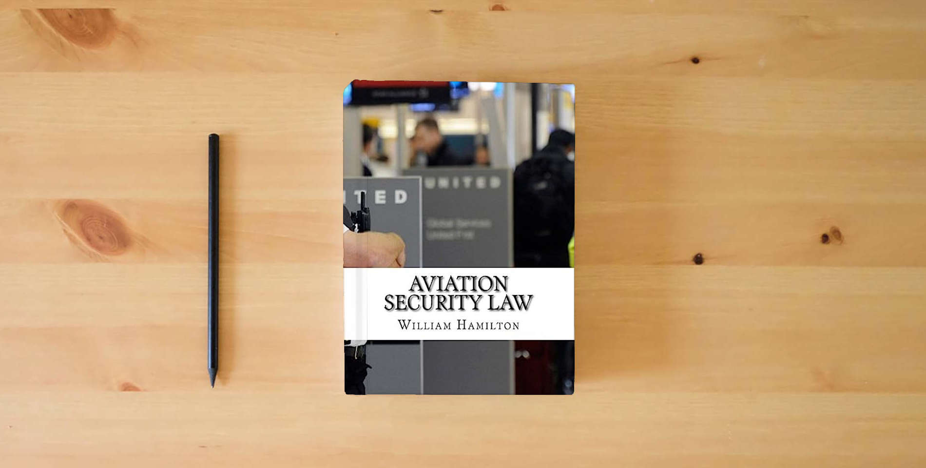 The book Aviation Security Law is on the table