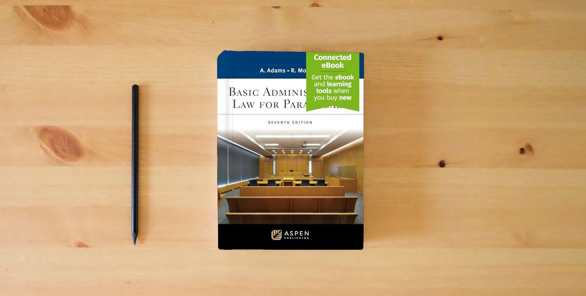 The book Basic Administrative Law for Paralegals: [Connected eBook] (Aspen Paralegal Series) is on the table