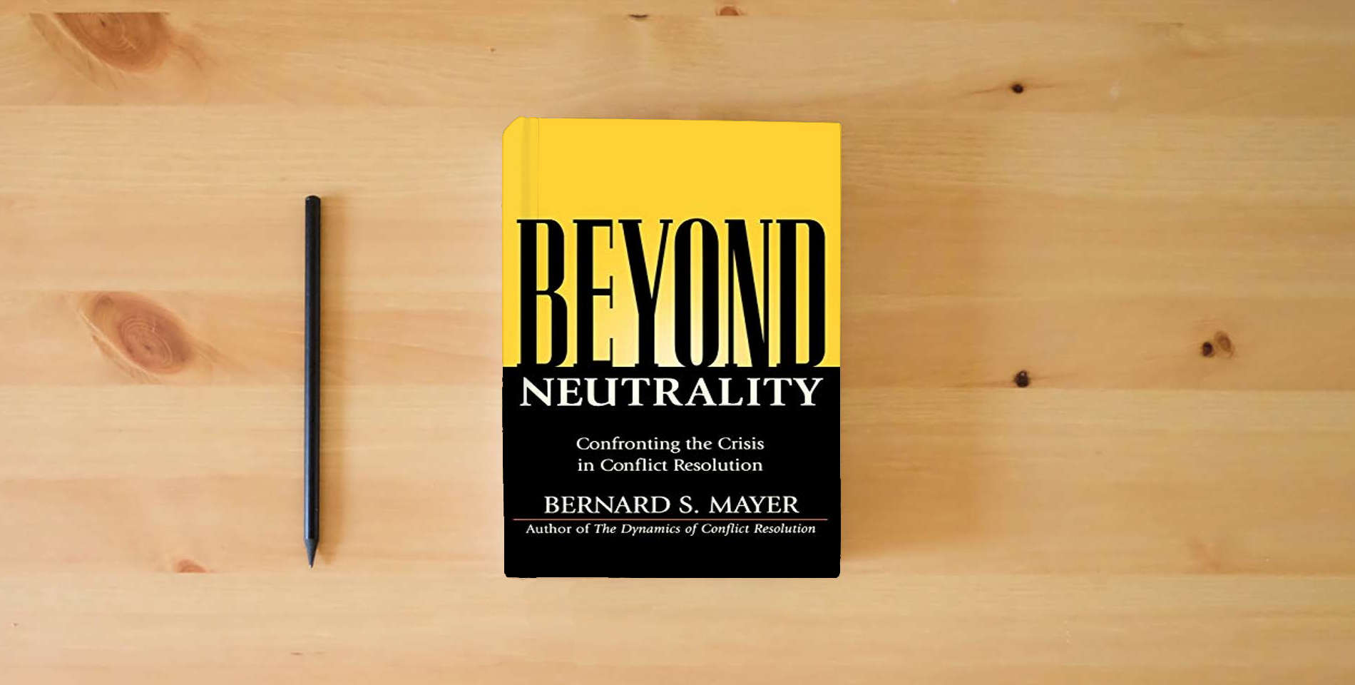 The book Beyond Neutrality: Confronting the Crisis in Conflict Resolution is on the table