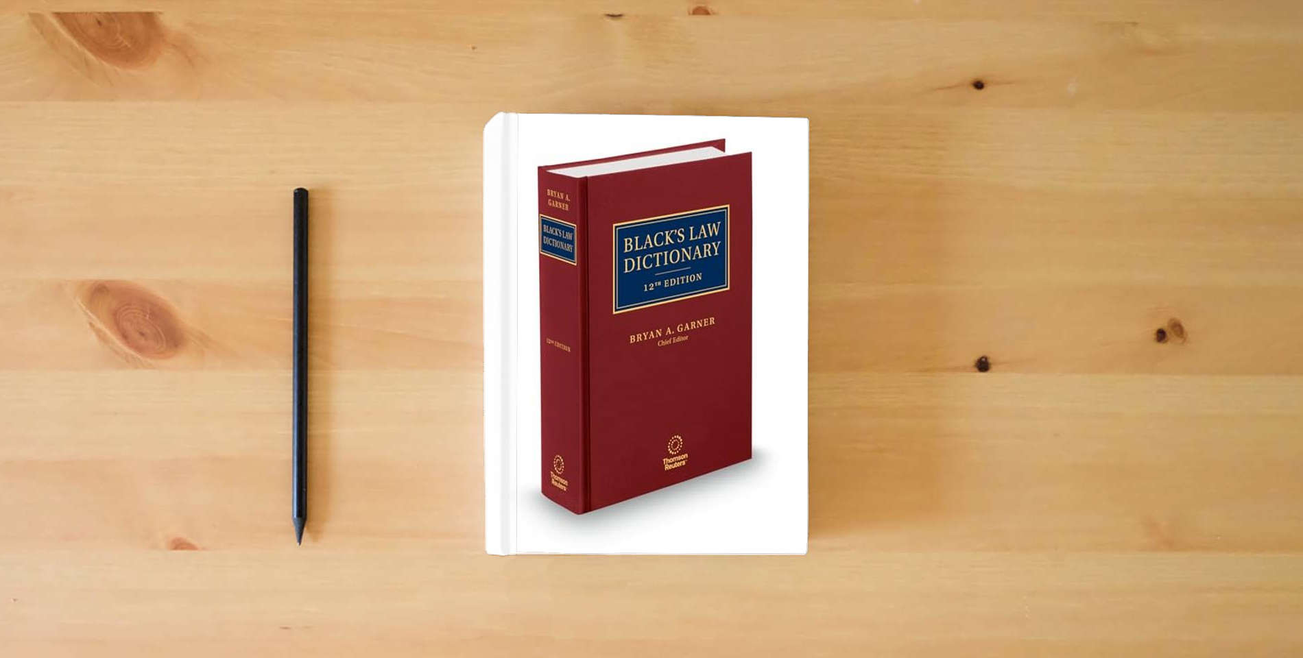 The book Black's Law Dictionary, 12th Edition is on the table