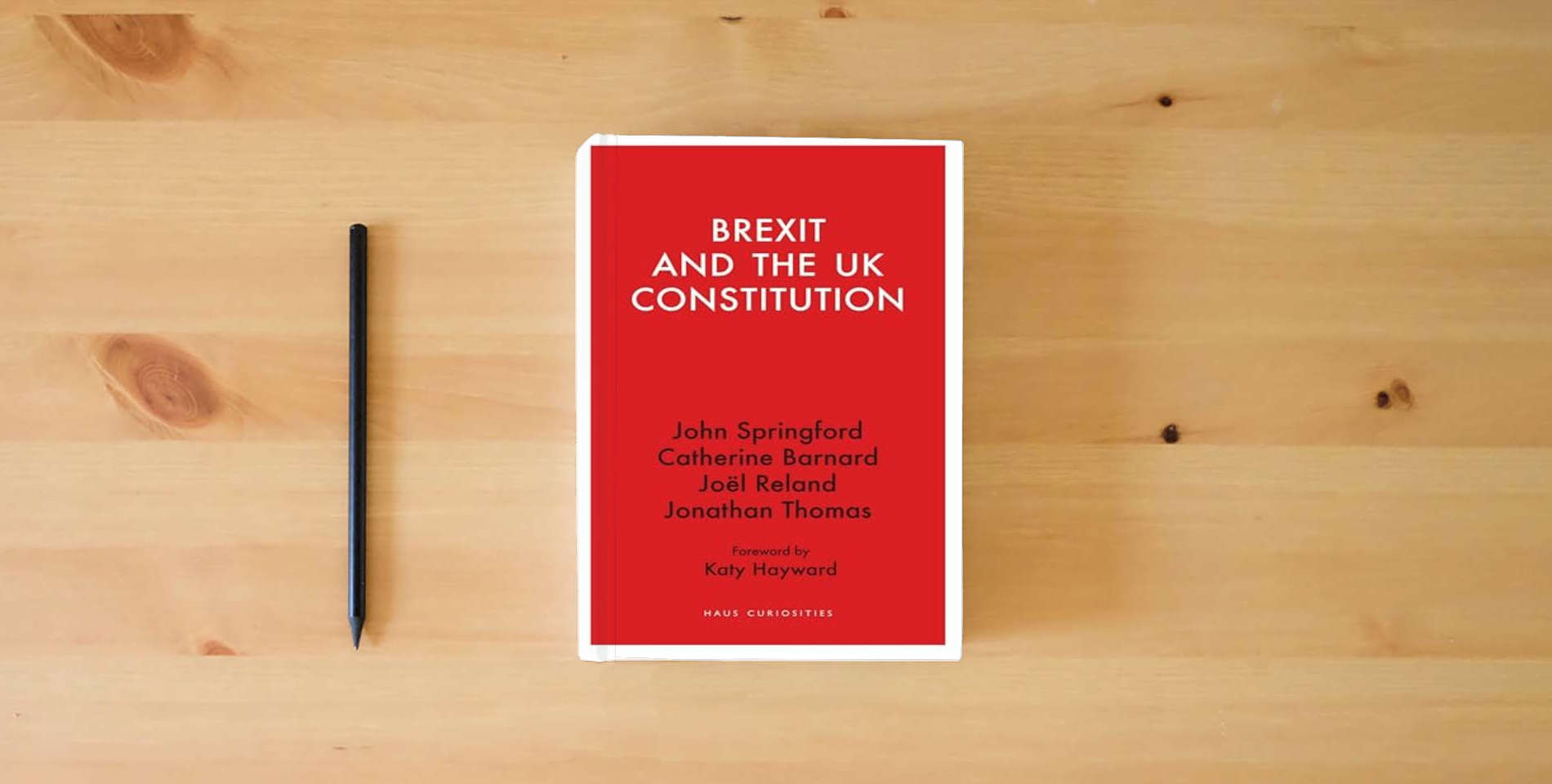 The book Brexit and the UK Constitution (Haus Curiosities) is on the table