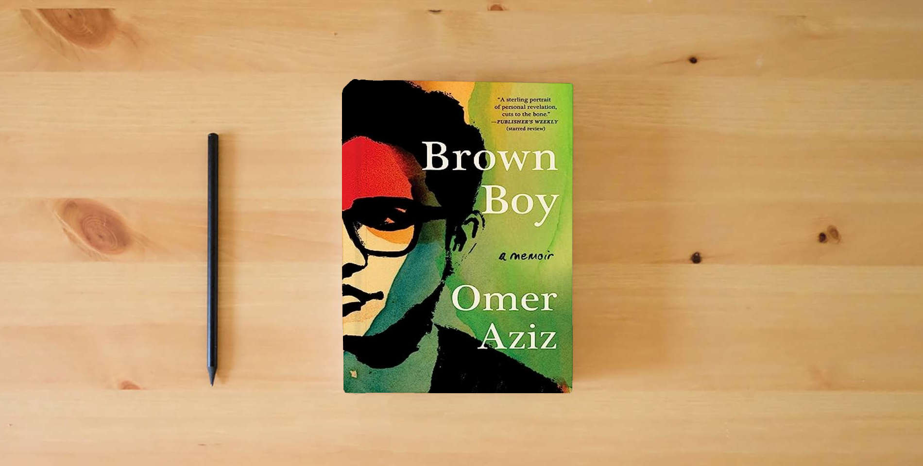 The book Brown Boy: A Memoir is on the table