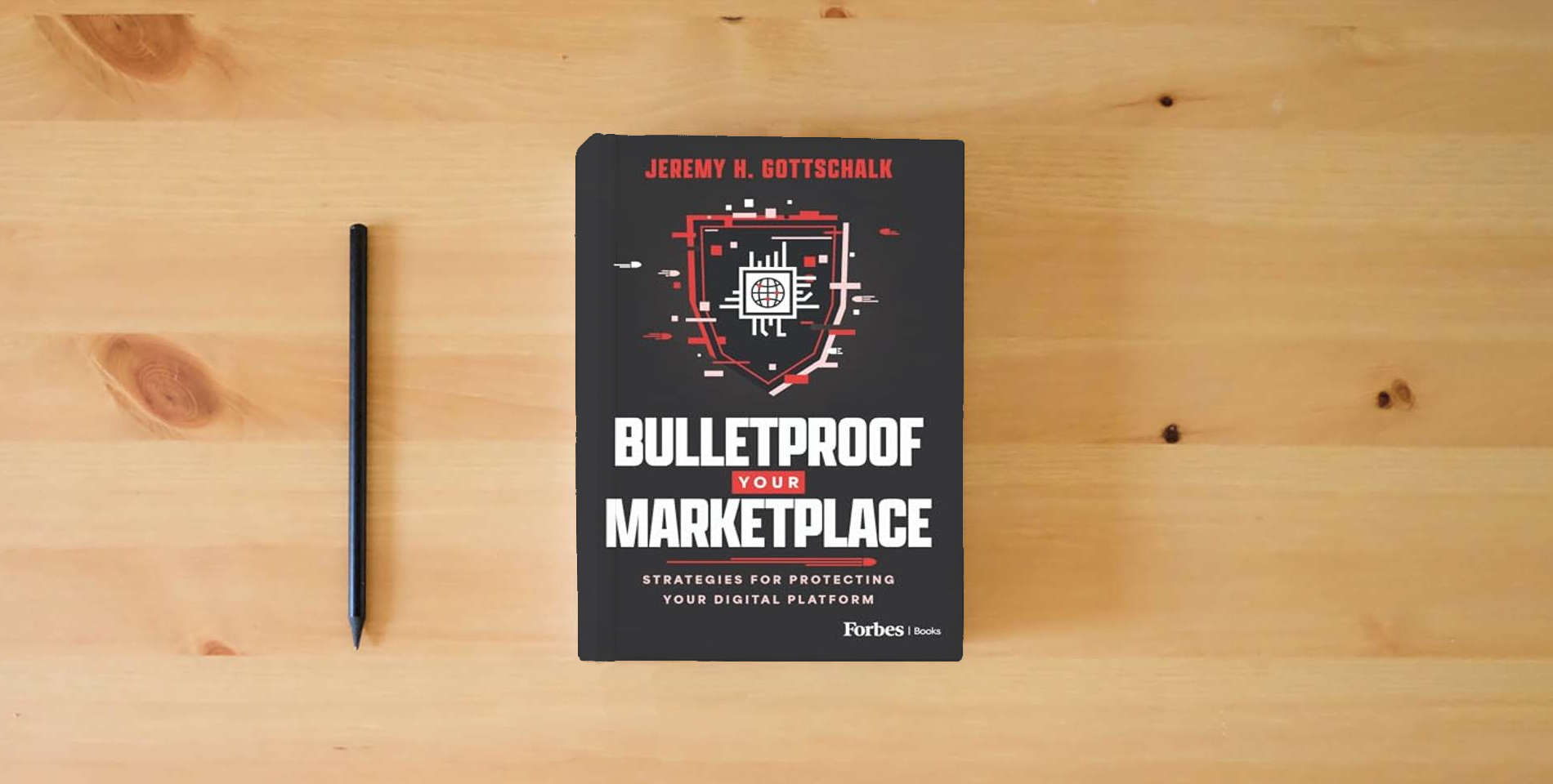 The book Bulletproof Your Marketplace: Strategies for Protecting Your Digital Platform is on the table