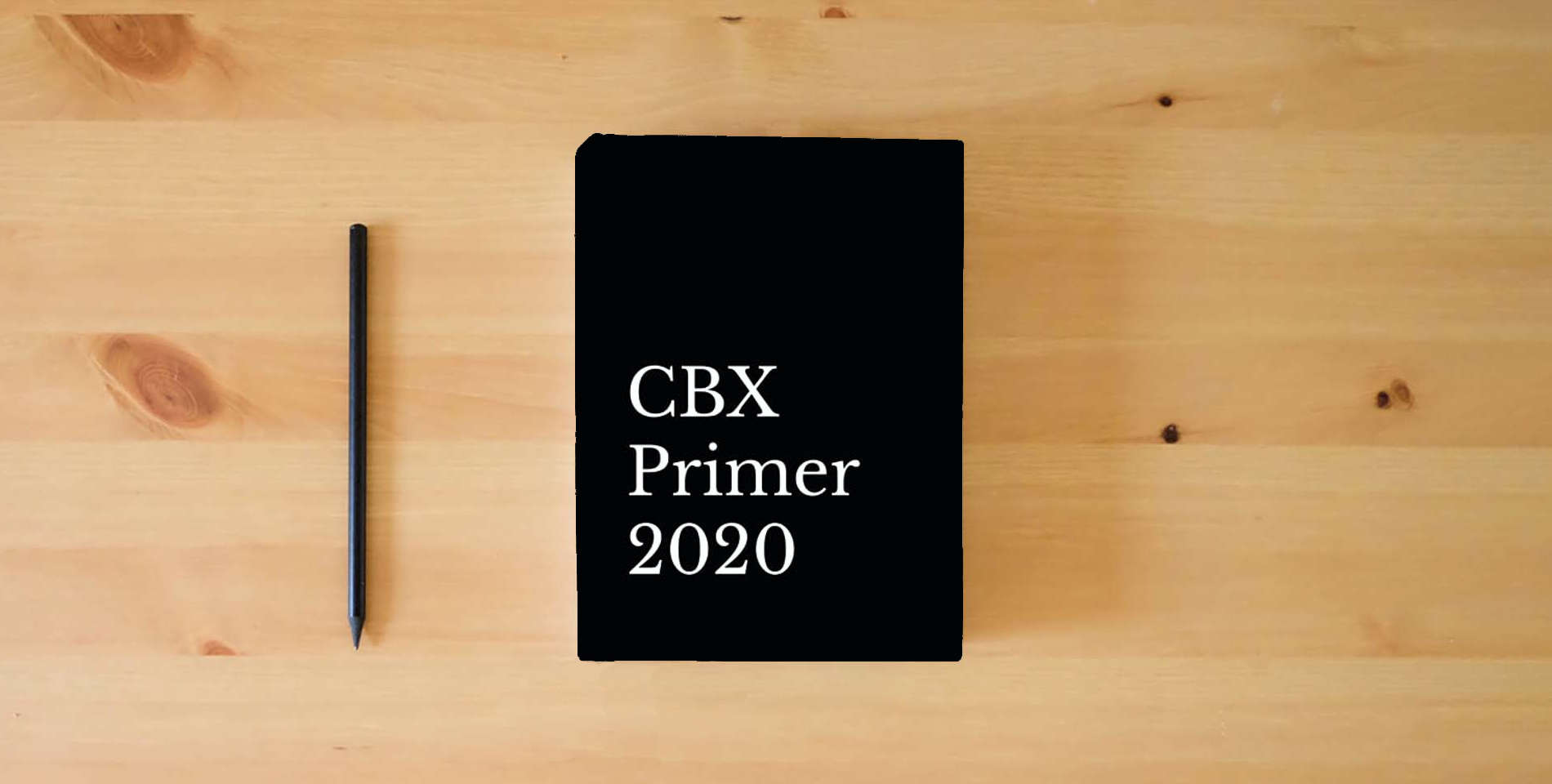 The book CBX Primer 2020 is on the table