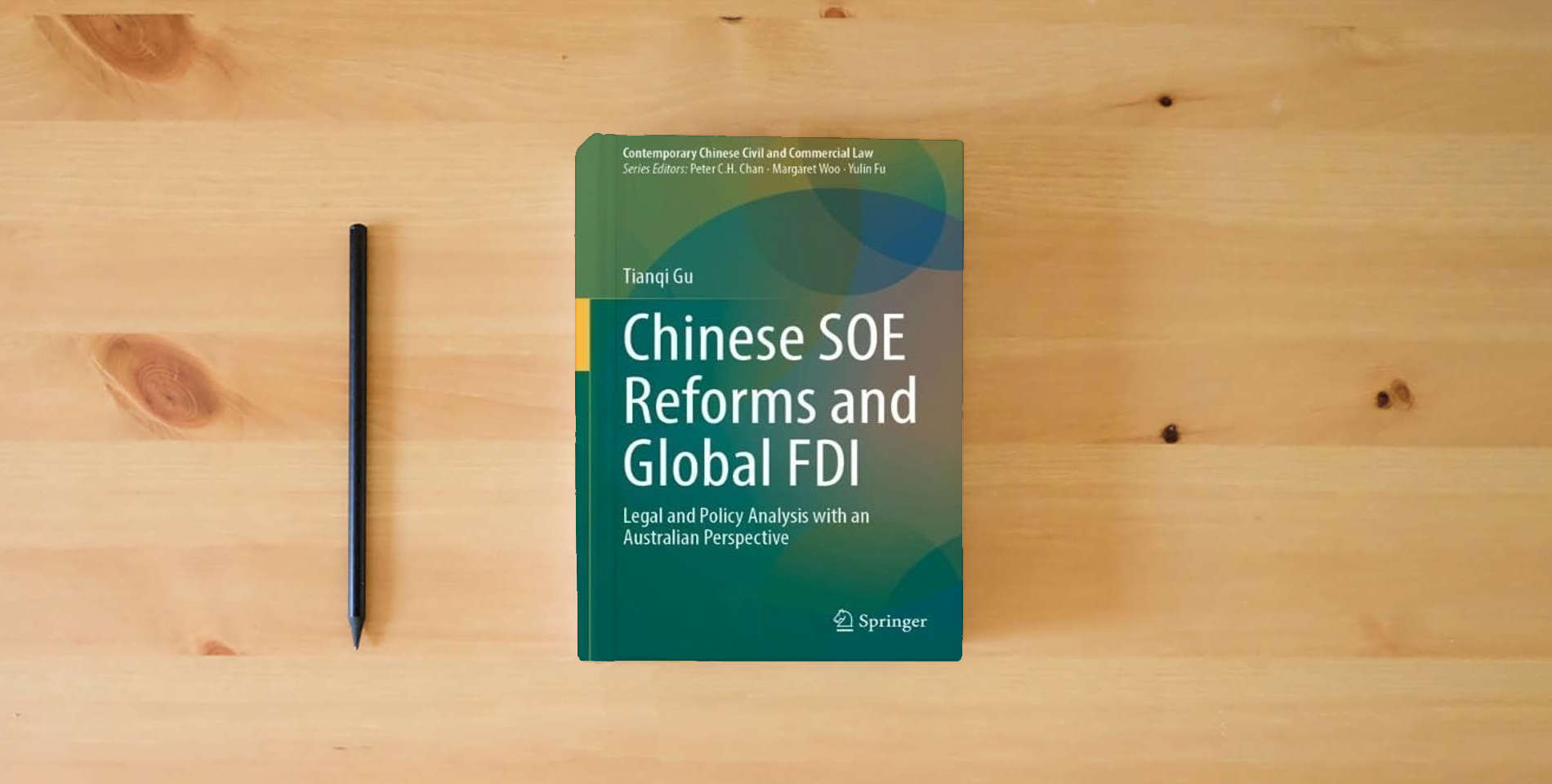 The book Chinese SOE Reforms and Global FDI: Legal and Policy Analysis with an Australian Perspective (Contemporary Chinese Civil and Commercial Law) is on the table