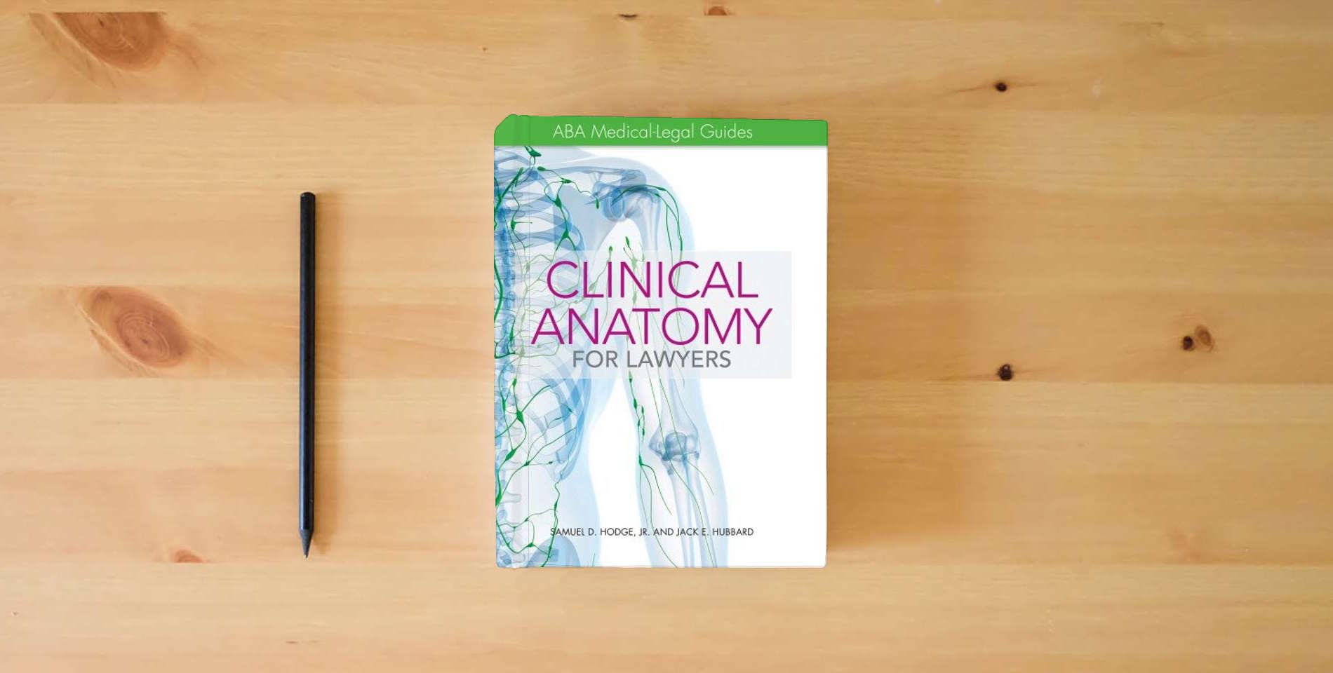 The book Clinical Anatomy for Lawyers: ABA Medical-Legal Guides is on the table