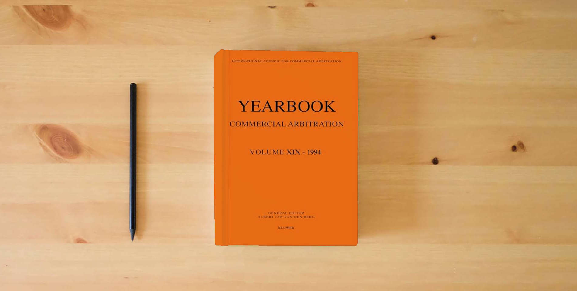 The book Commercial Arbitration Yearbook 1996 (YEARBOOK COMMERCIAL ARBITRATION) is on the table