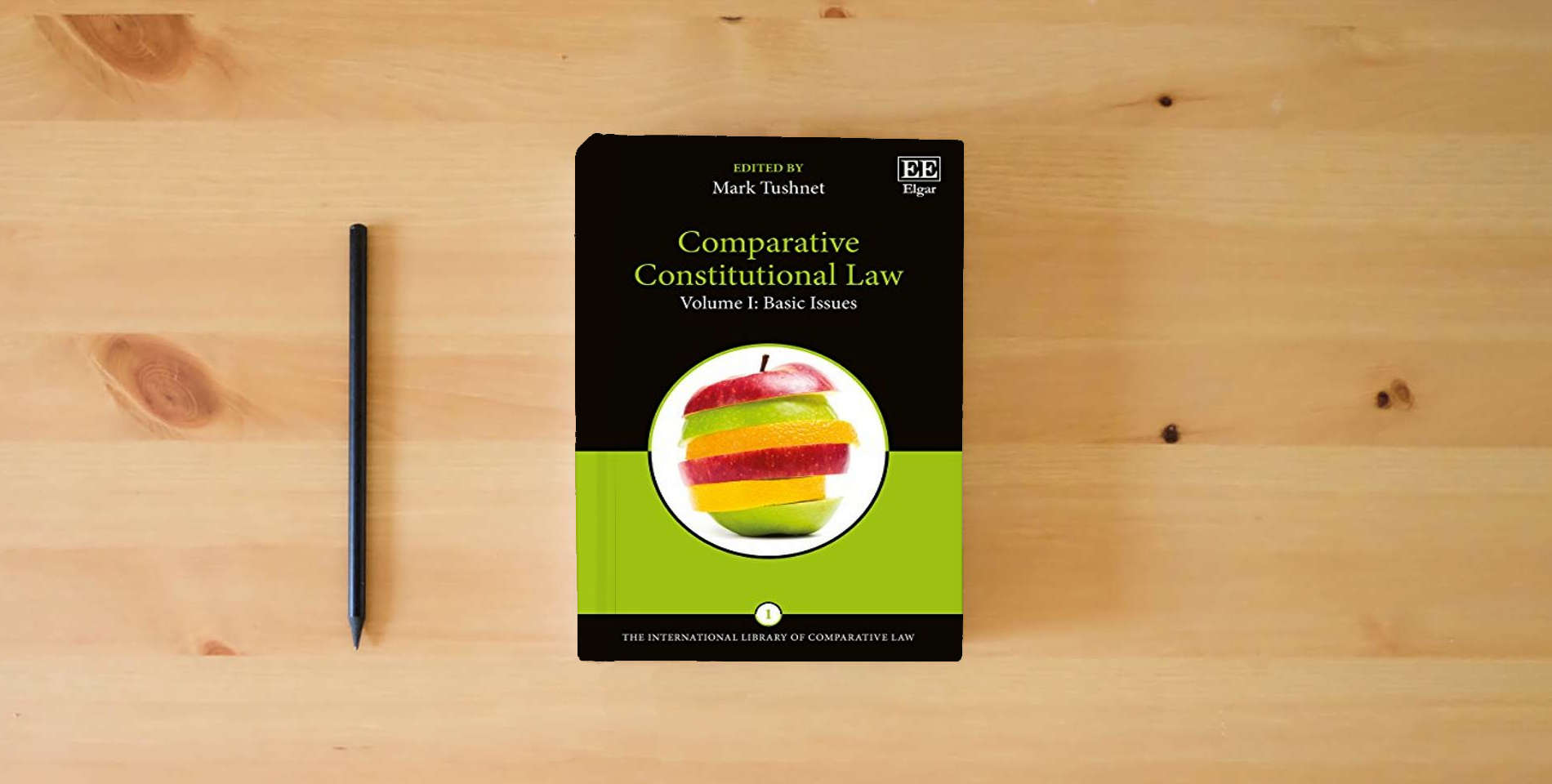 The book Comparative Constitutional Law (The International Library of Comparative Law series, 1) is on the table