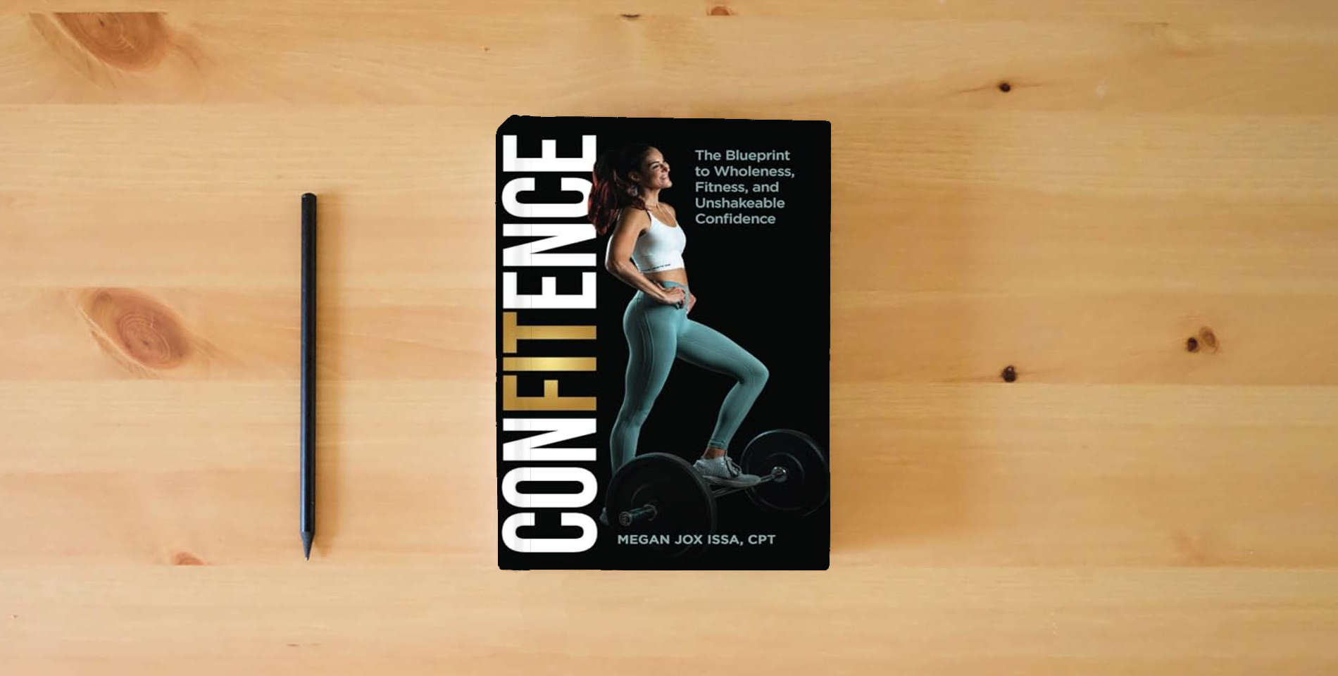 The book ConFITence: The Blueprint to Wholeness, Fitness, and Unshakeable Confidence is on the table