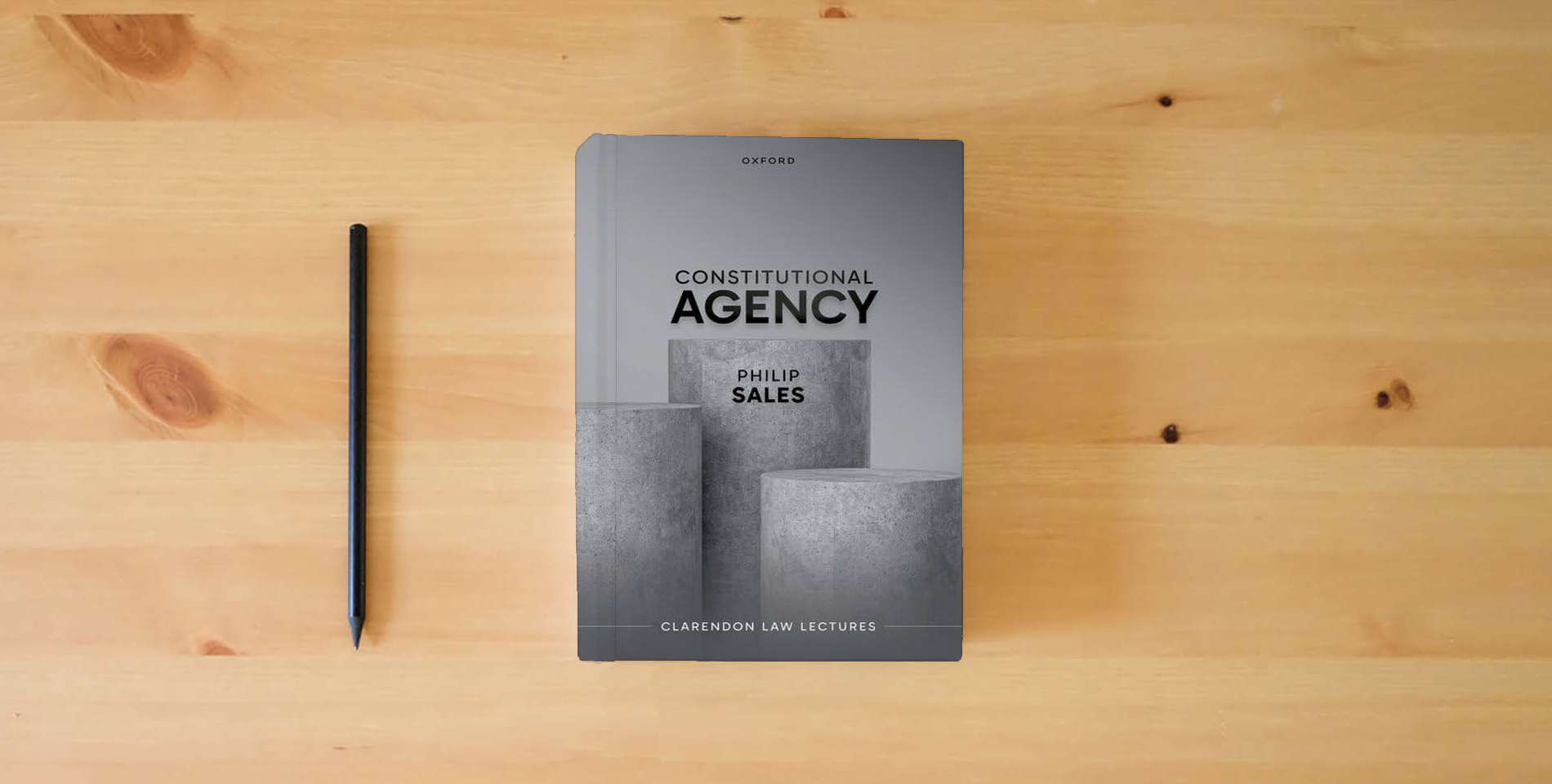 The book Constitutional Agency is on the table