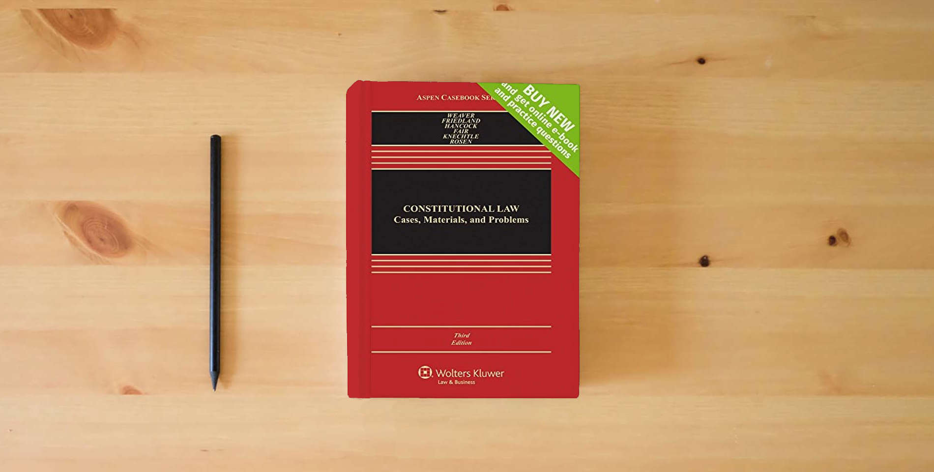 The book Constitutional Law: Cases, Materials, and Problems [Connected Casebook] (Looseleaf) (Aspen Casebook) is on the table