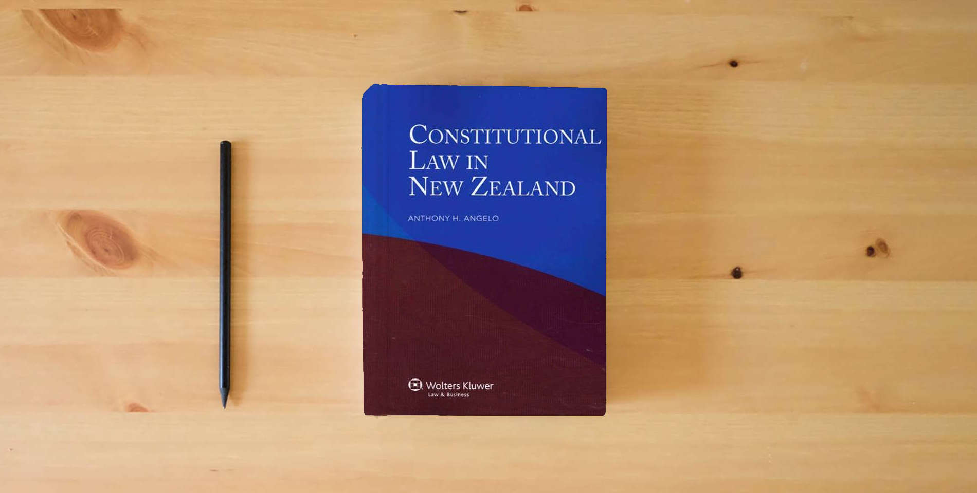 The book Constitutional Law in New Zealand is on the table
