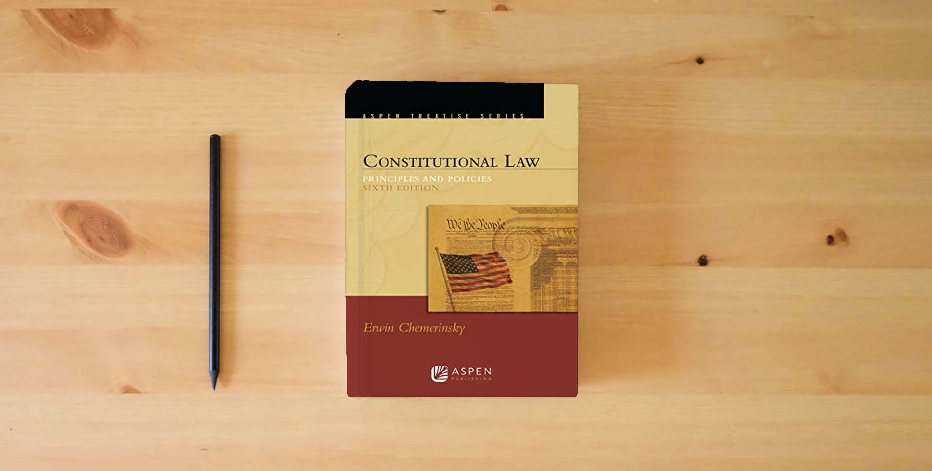 The book Constitutional Law: Principles and Policies (Aspen Treatise) is on the table