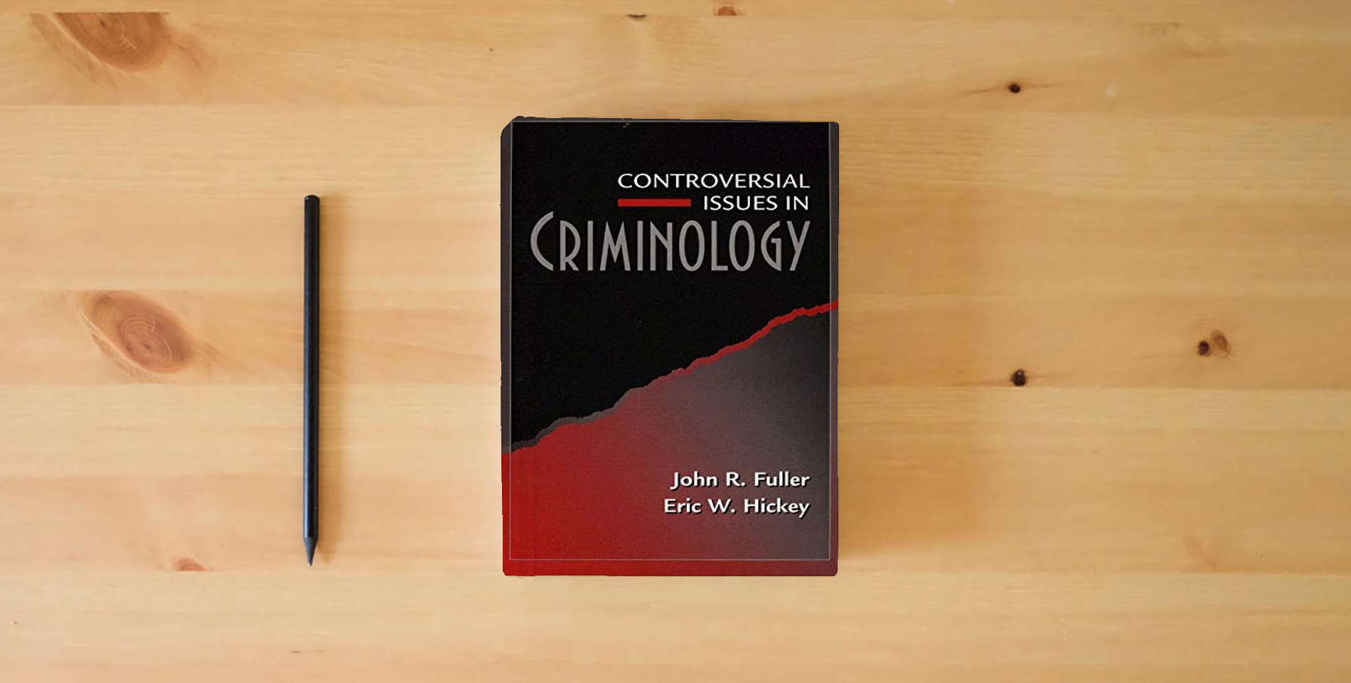 The book Controversial Issues in Criminology is on the table