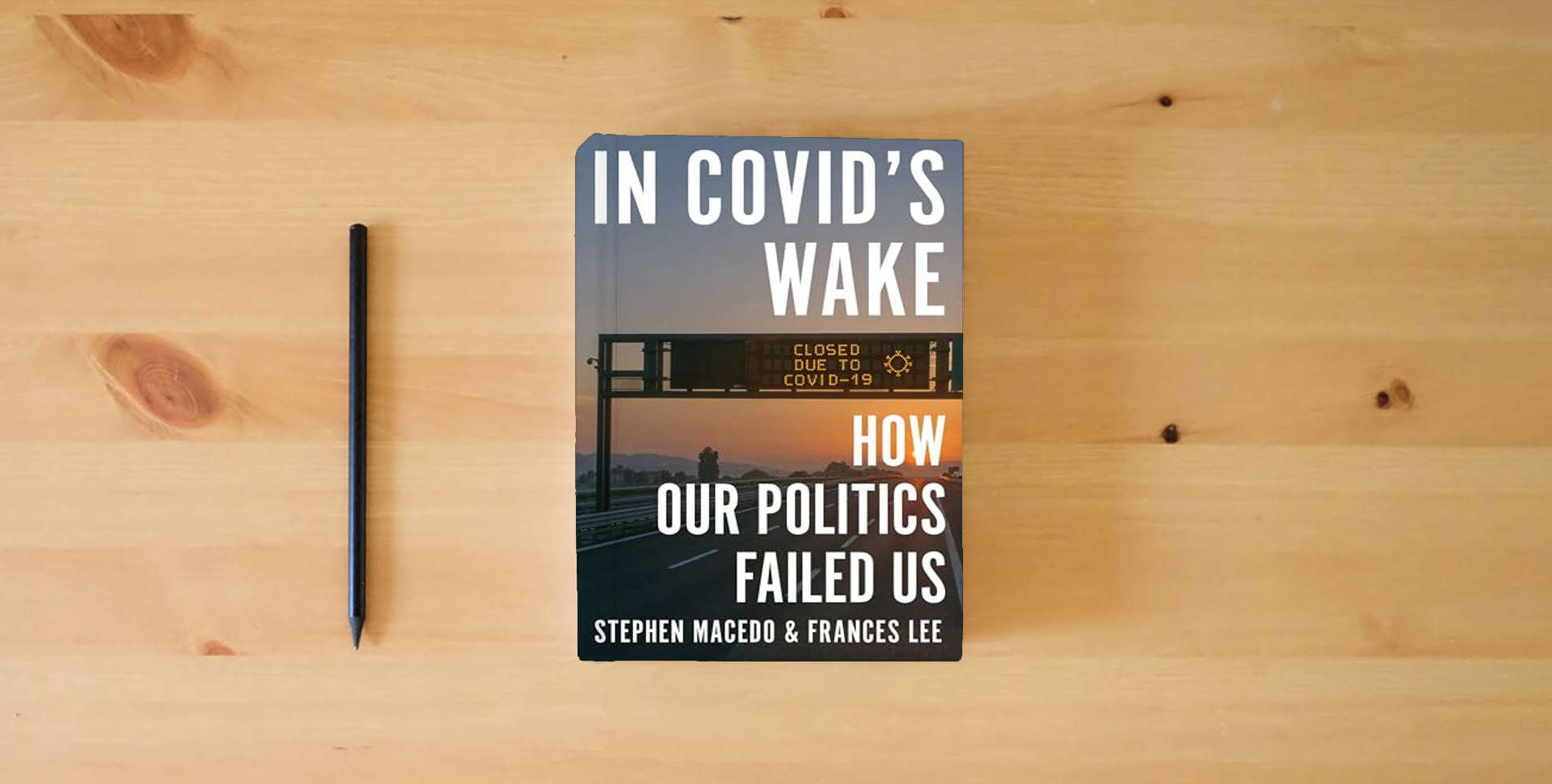 The book In Covid's Wake: How Our Politics Failed Us is on the table