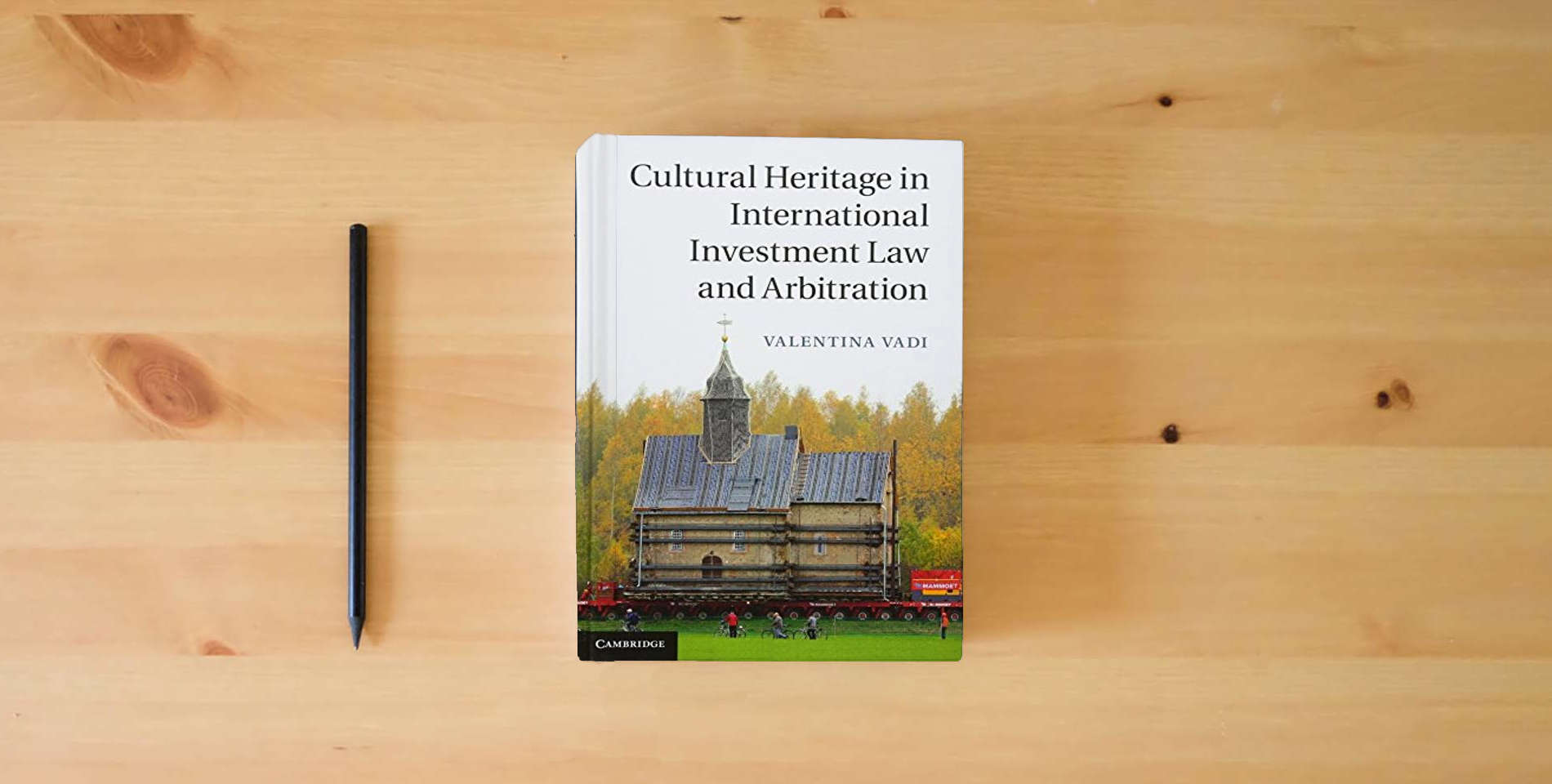 The book Cultural Heritage in International Investment Law and Arbitration is on the table