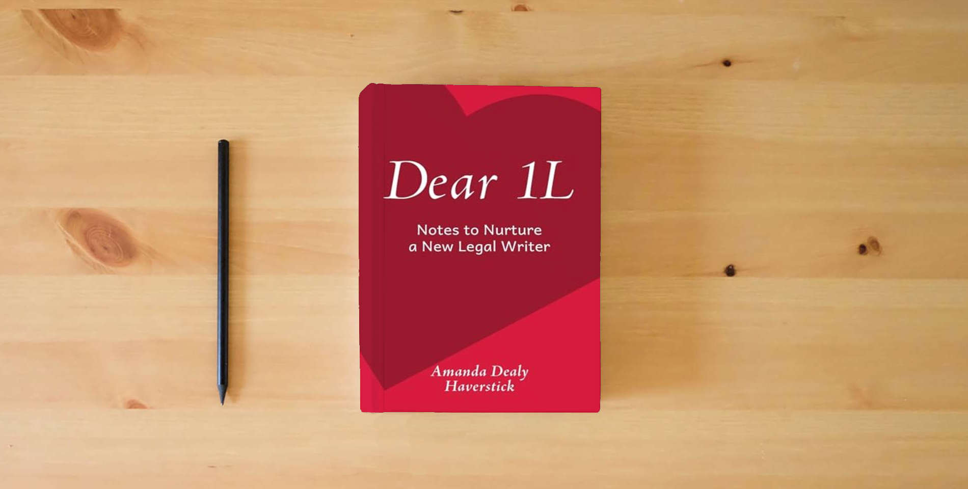 The book Dear 1L: Notes to Nurture a New Legal Writer is on the table