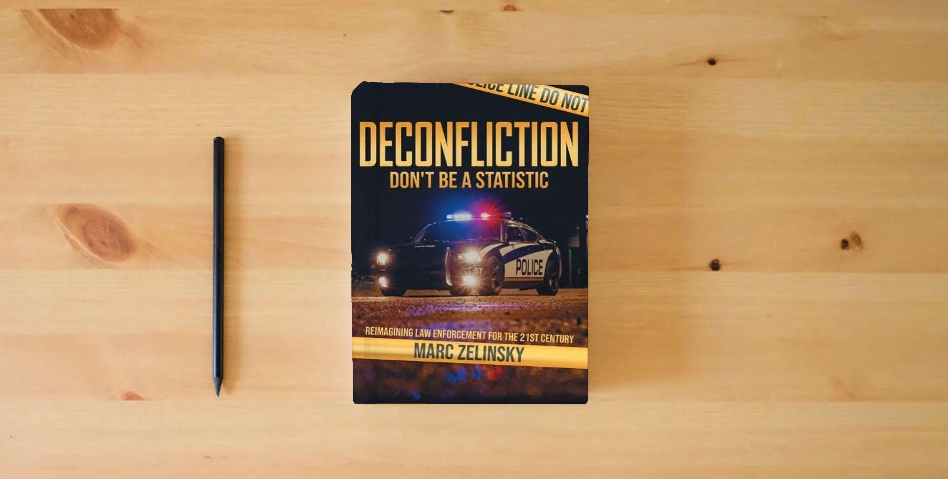 The book Deconfliction: Don't Be a Statistic is on the table