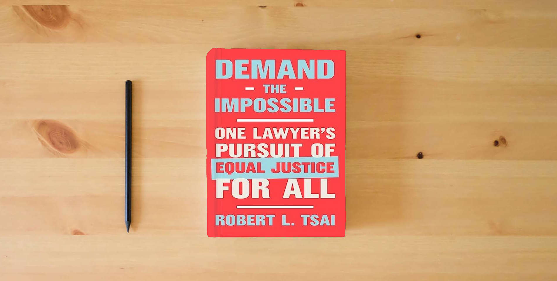 The book Demand the Impossible: One Lawyer's Pursuit of Equal Justice for All is on the table
