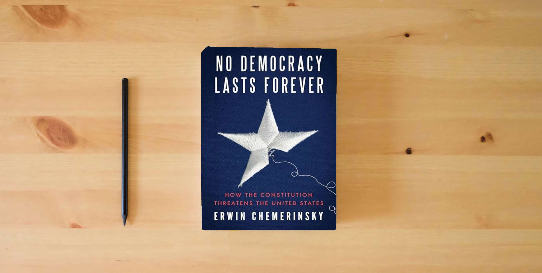The book No Democracy Lasts Forever: How the Constitution Threatens the United States is on the table