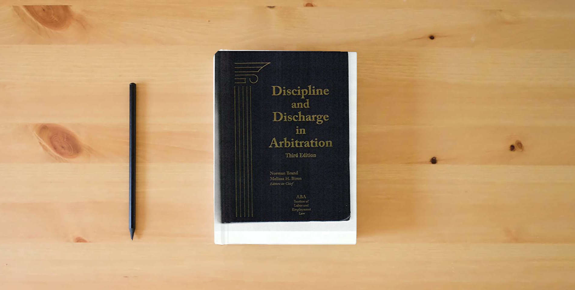 The book Discipline and Discharge in Arbitration is on the table