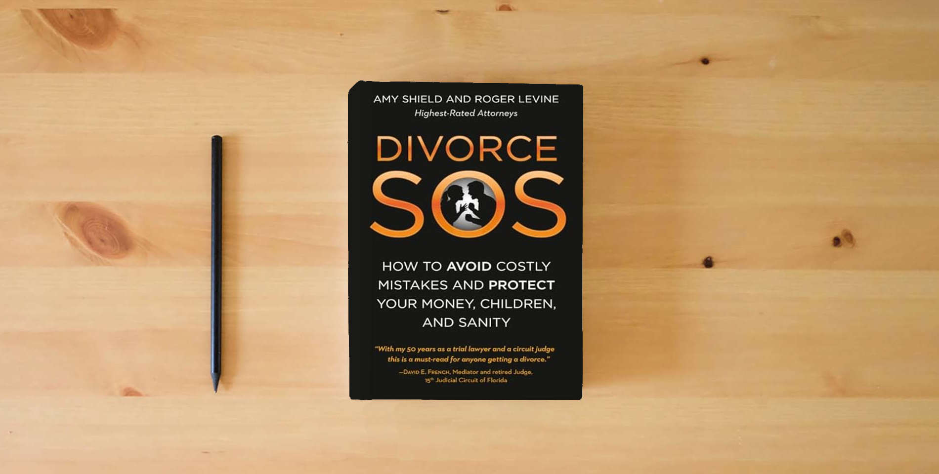 The book Divorce SOS: How to Avoid Costly Mistakes and Protect Your Money, Children, and Sanity is on the table