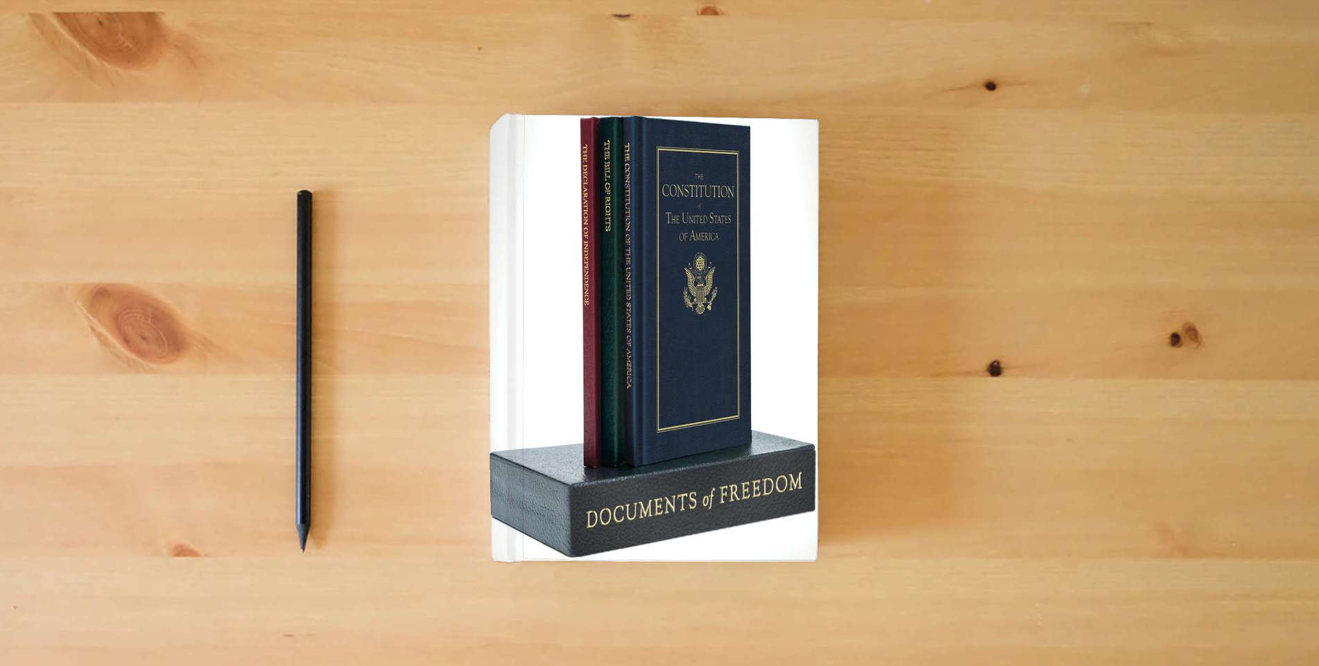 The book Documents of Freedom Boxed Set (Books of American Wisdom) is on the table