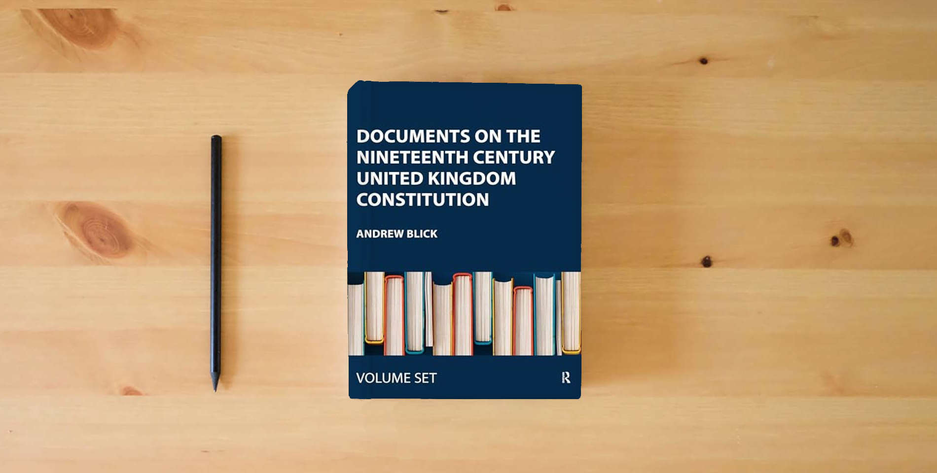 The book Documents on the Nineteenth Century United Kingdom Constitution is on the table
