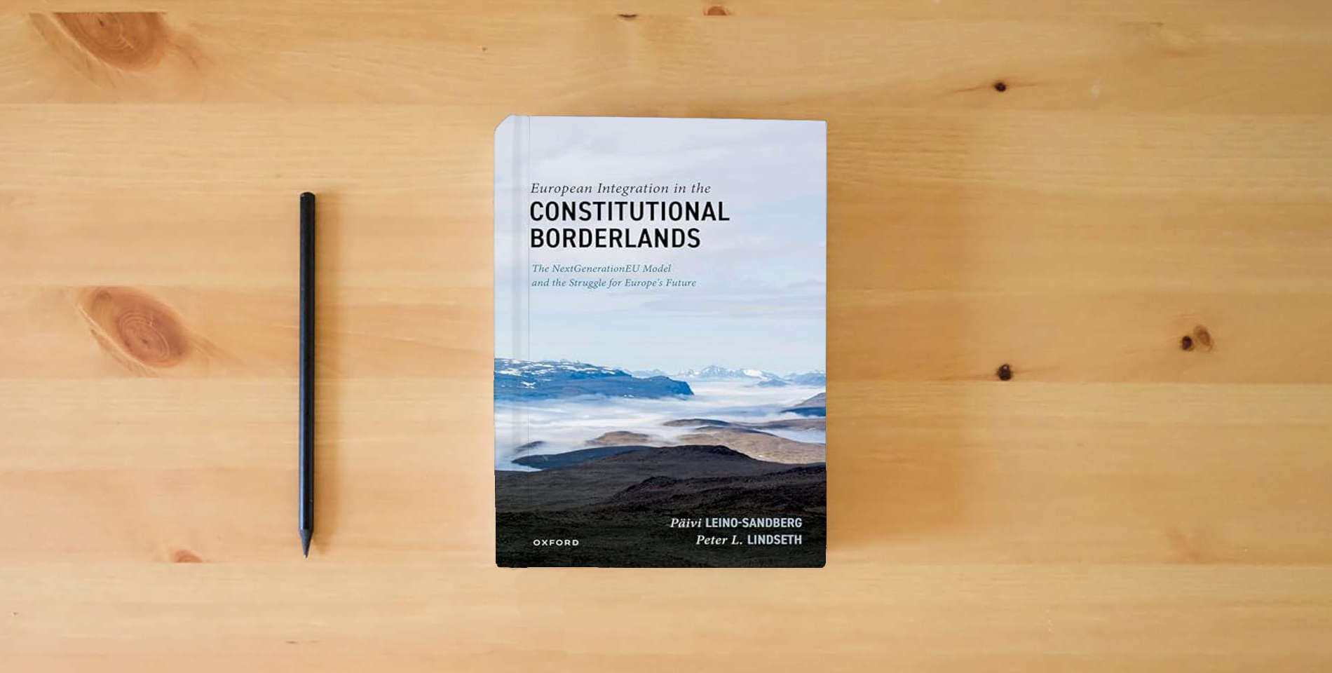 The book European Integration in the Constitutional Borderlands: The NextGenerationEU Model and the Struggle for Europe's Future is on the table