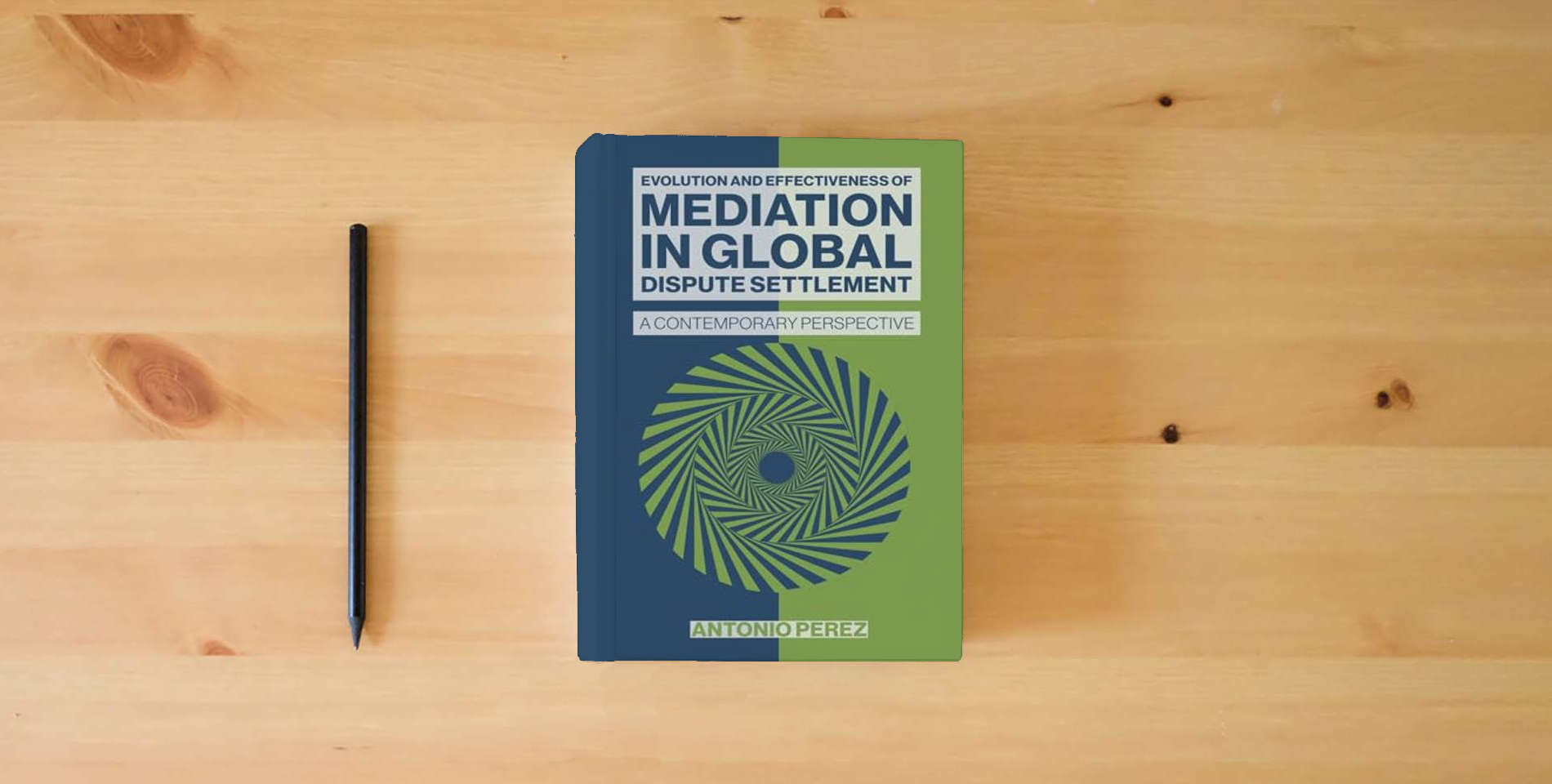 The book EVOLUTION AND EFFECTIVENESS OF MEDIATION IN GLOBAL DISPUTE SETTLEMENT: A CONTEMPORARY PERSPECTIVE is on the table