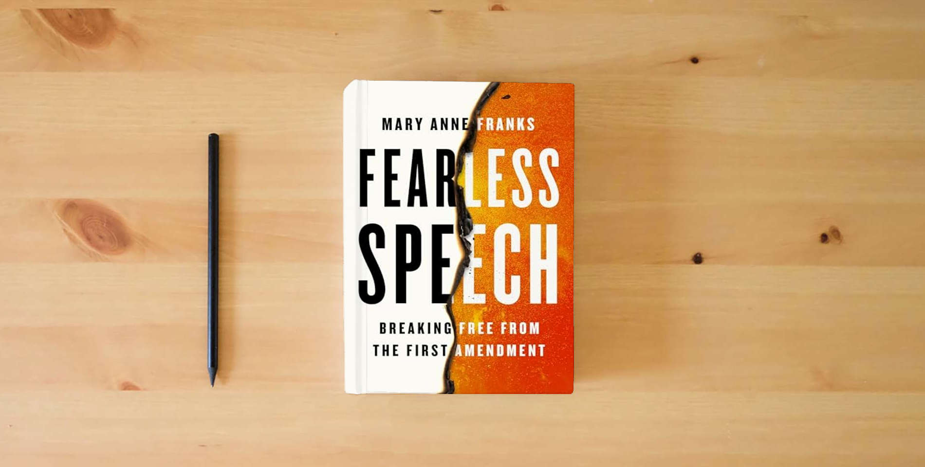 The book Fearless Speech: Breaking Free from the First Amendment is on the table