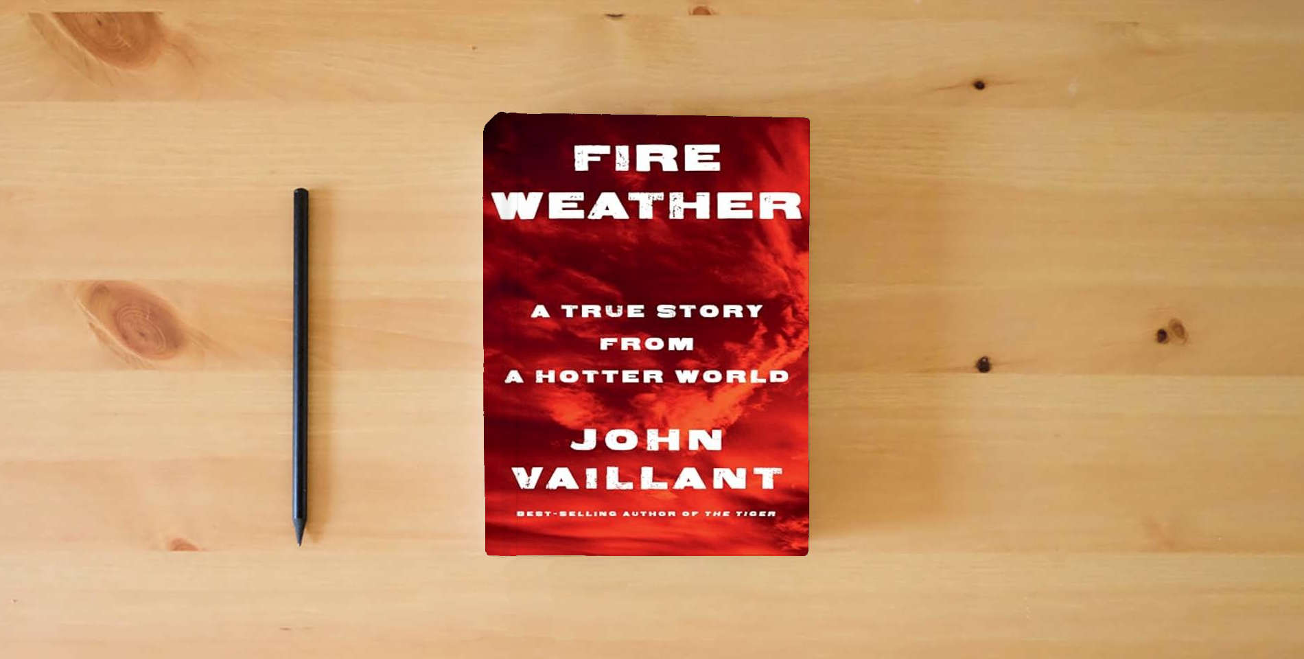 The book Fire Weather: A True Story from a Hotter World is on the table