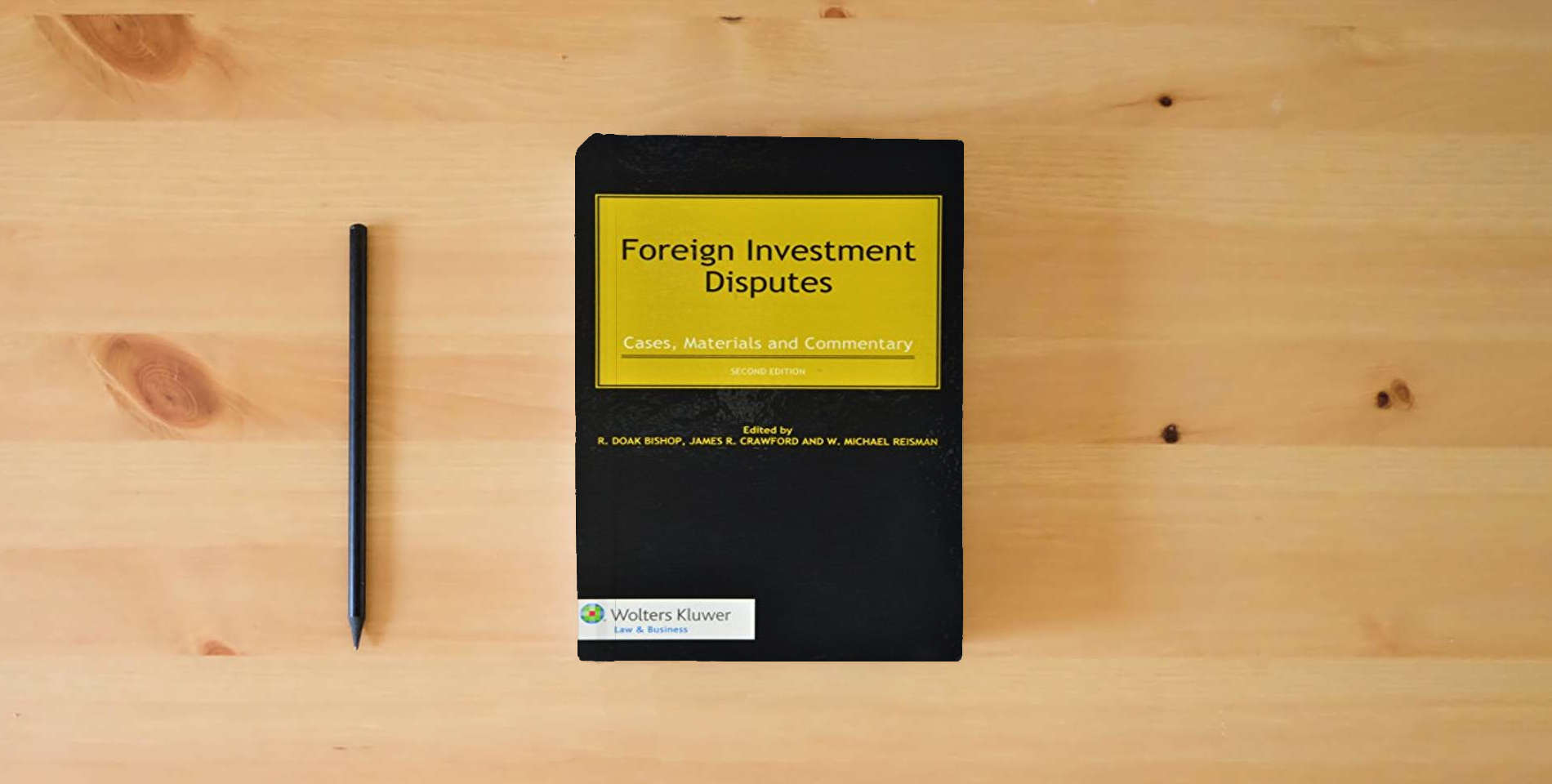 The book Foreign Investment Disputes: Cases, Materials and Commentary is on the table