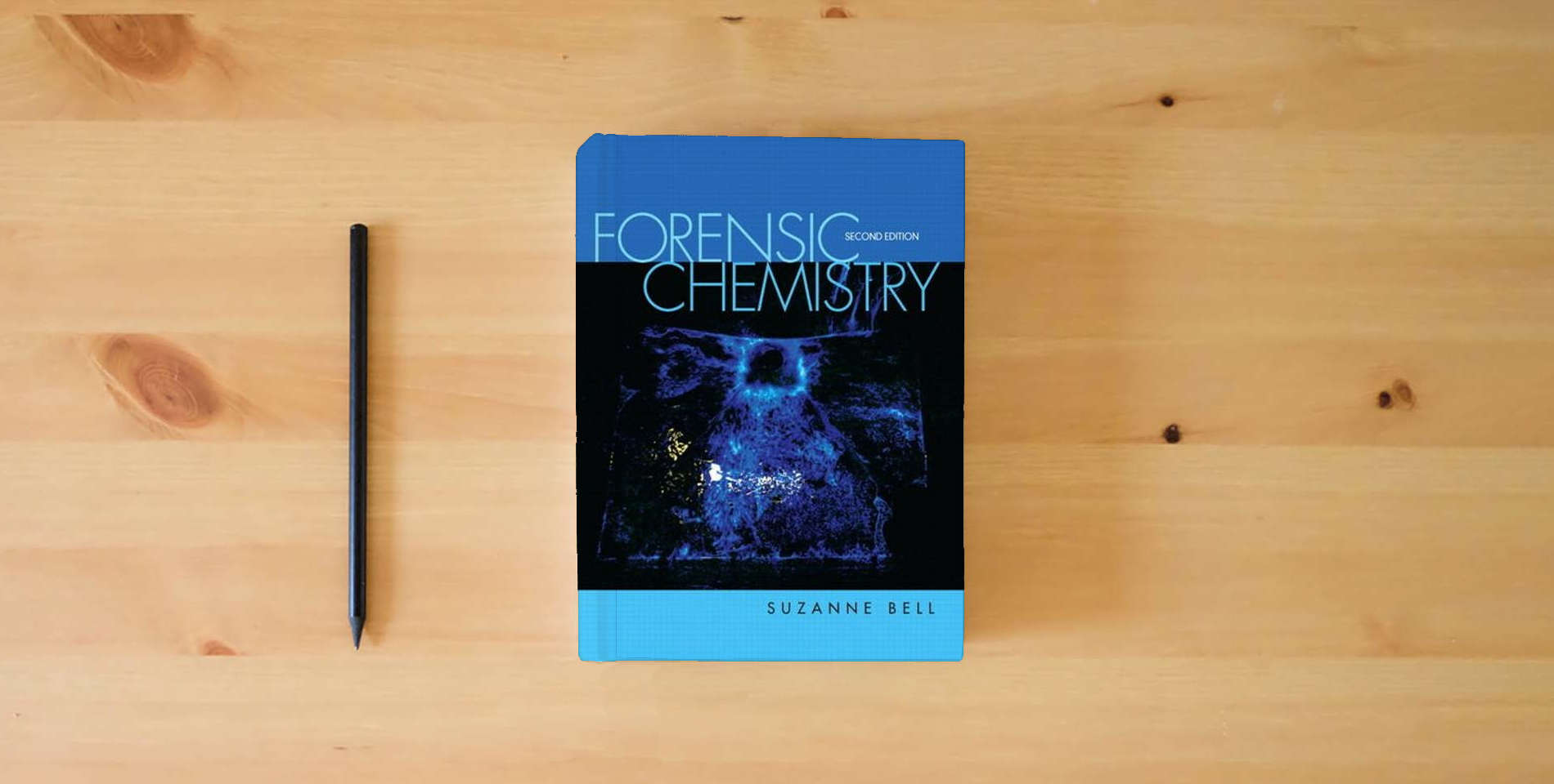 The book Forensic Chemistry (2nd Edition) is on the table