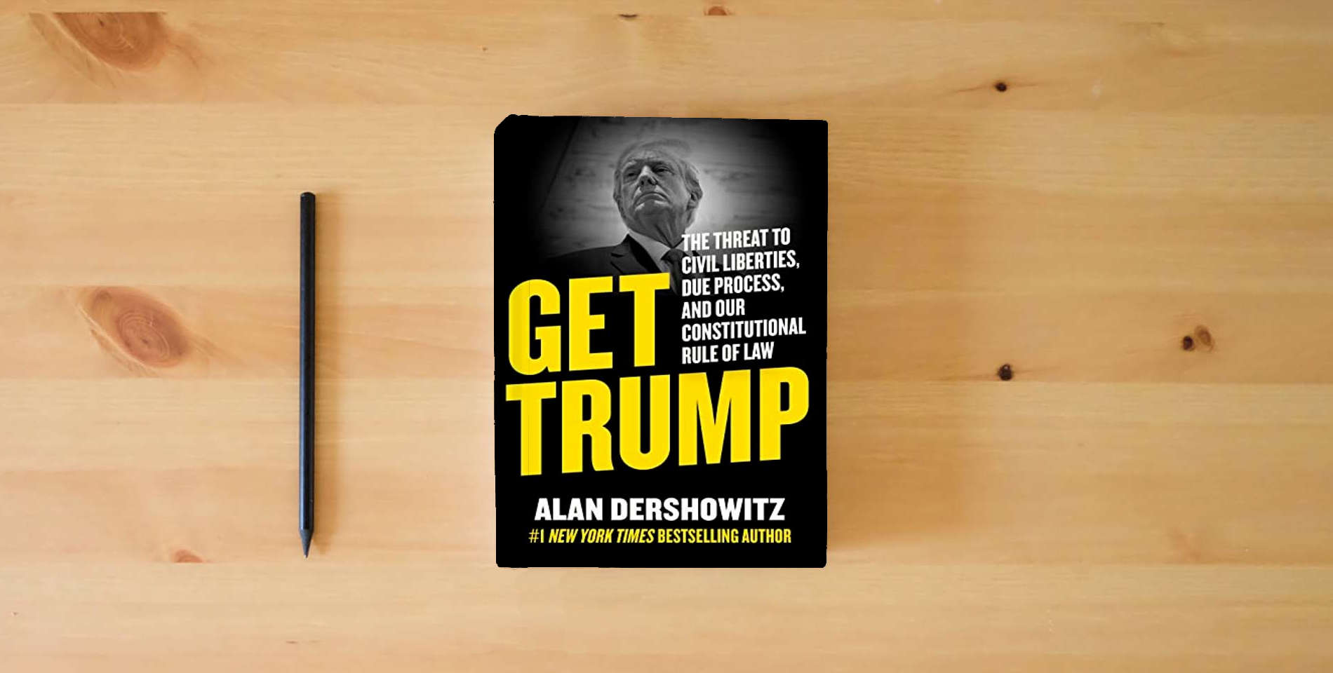 The book Get Trump: The Threat to Civil Liberties, Due Process, and Our Constitutional Rule of Law is on the table