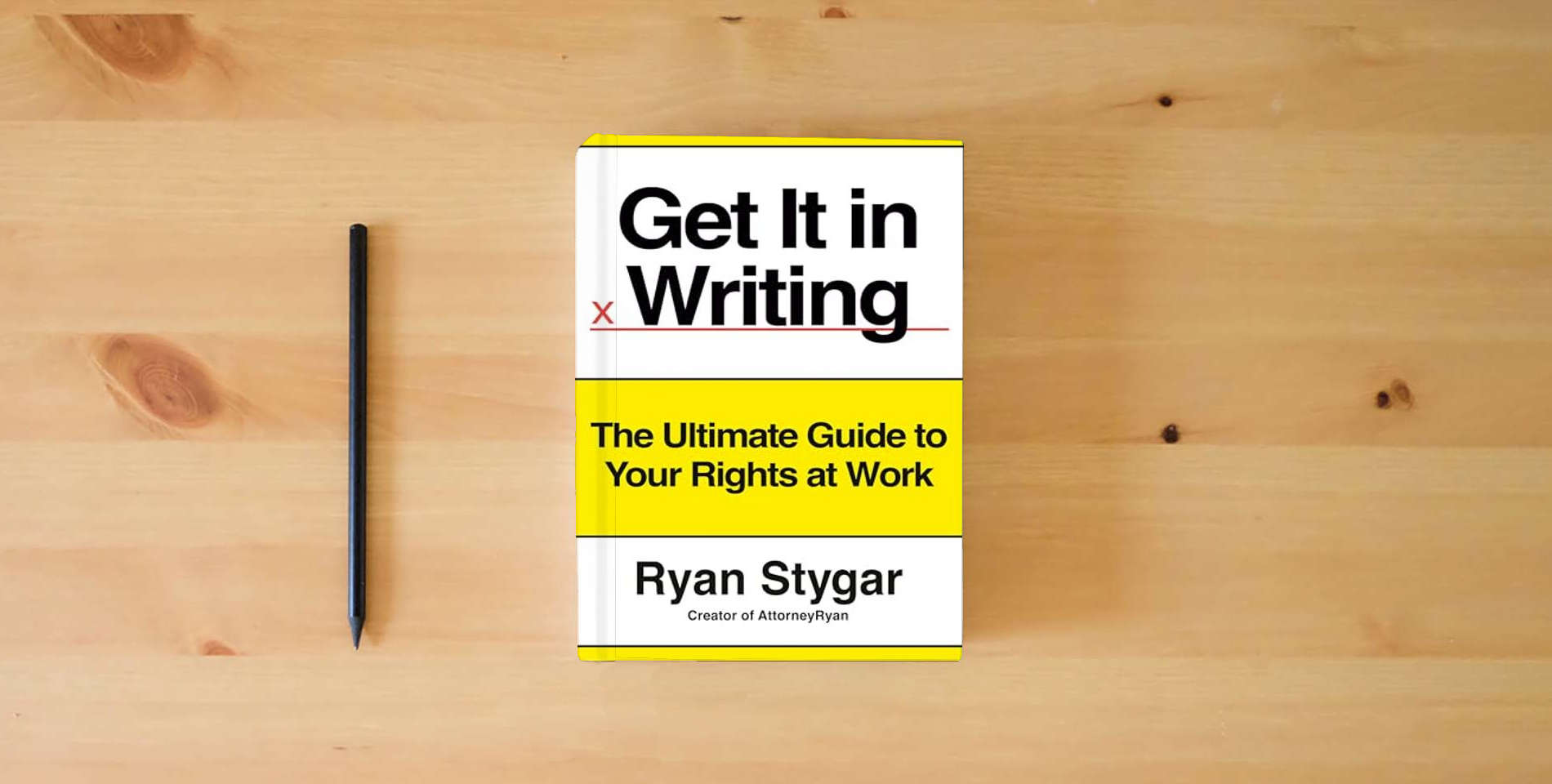 The book Get It in Writing: The Ultimate Guide to Your Rights at Work is on the table