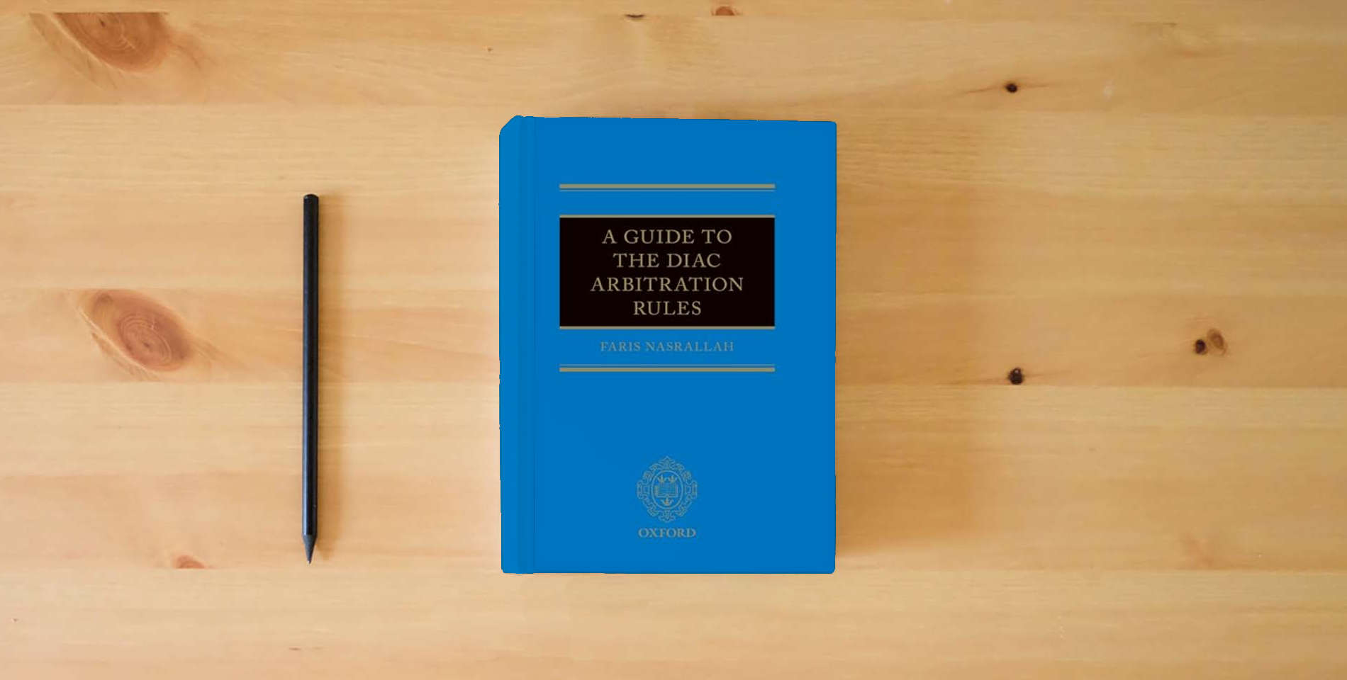 The book A Guide to the DIAC Arbitration Rules is on the table