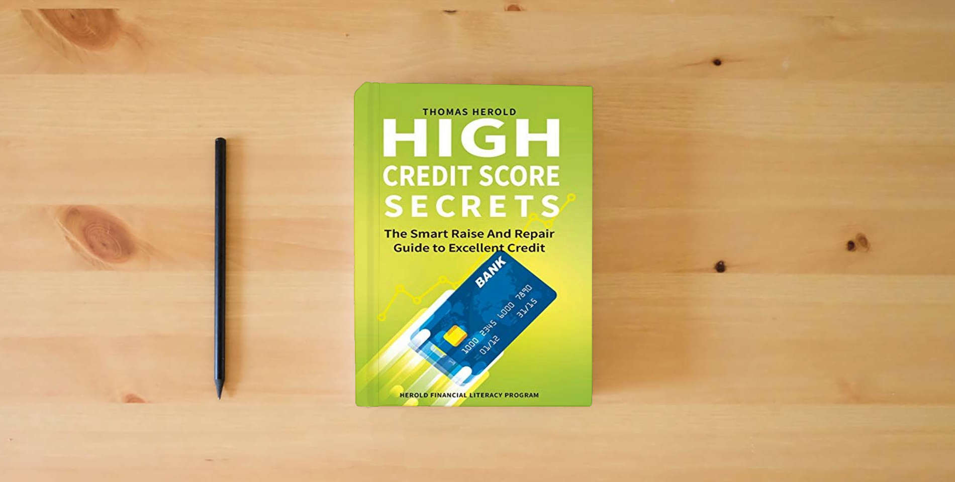 The book High Credit Score Secrets - The Smart Raise And Repair Guide to Excellent Credit (Herold Financial Literacy Program) is on the table
