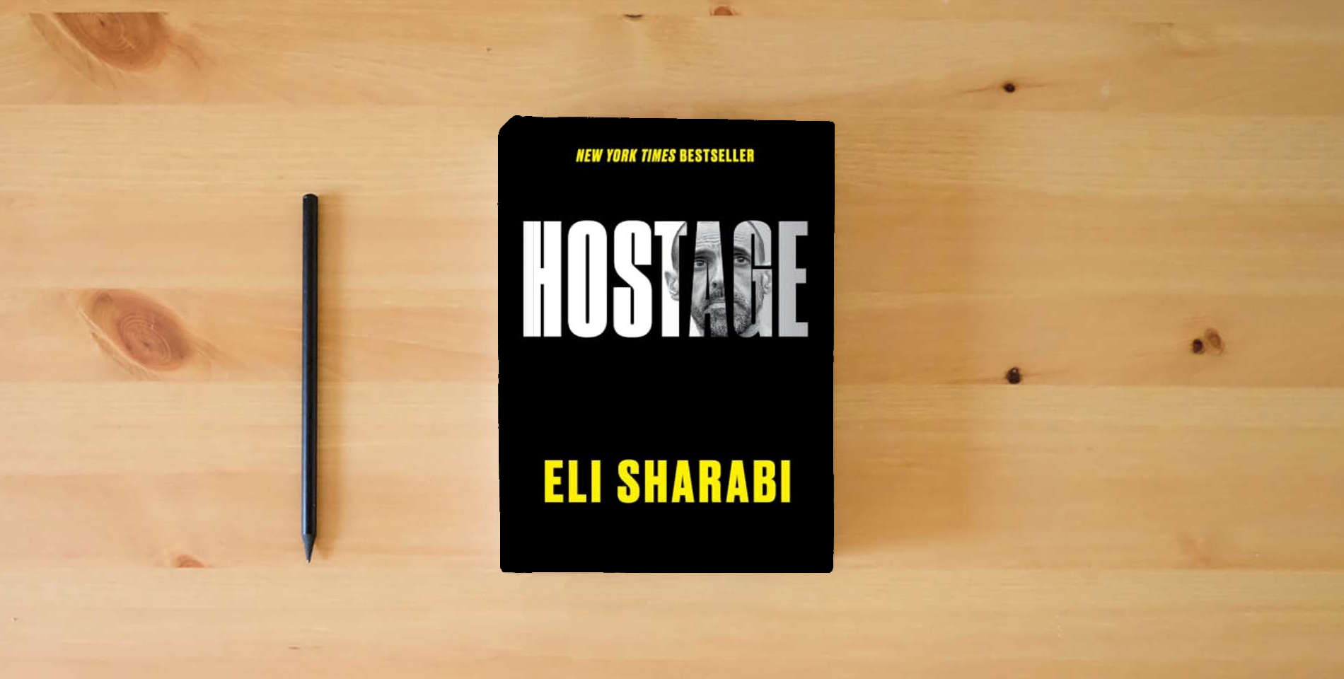 The book Hostage: An NYT Bestselling War Memoir of Survival and the Human Spirit in Gaza is on the table