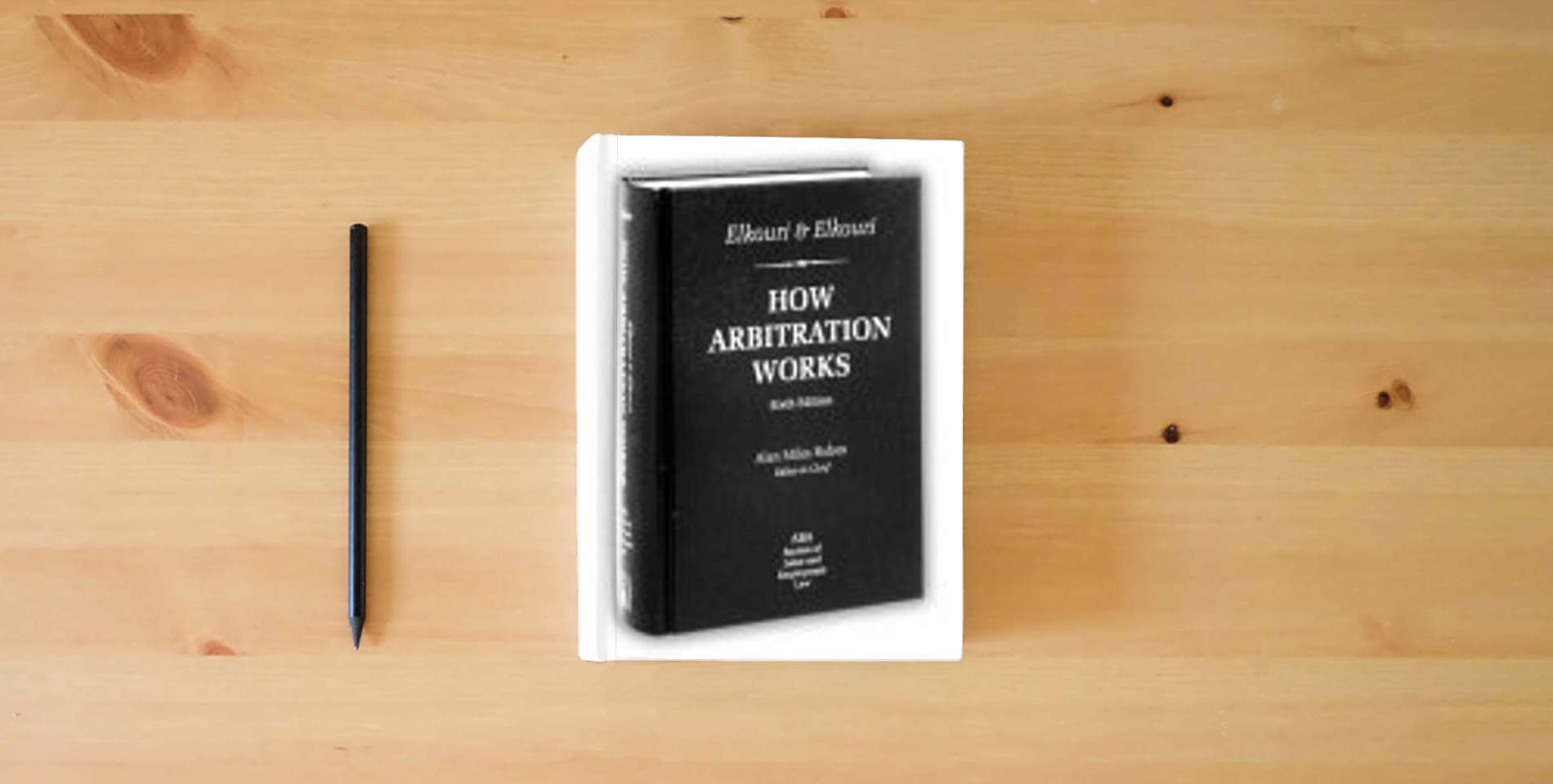 The book How Arbitration Works: Elkouri & Elkouri is on the table