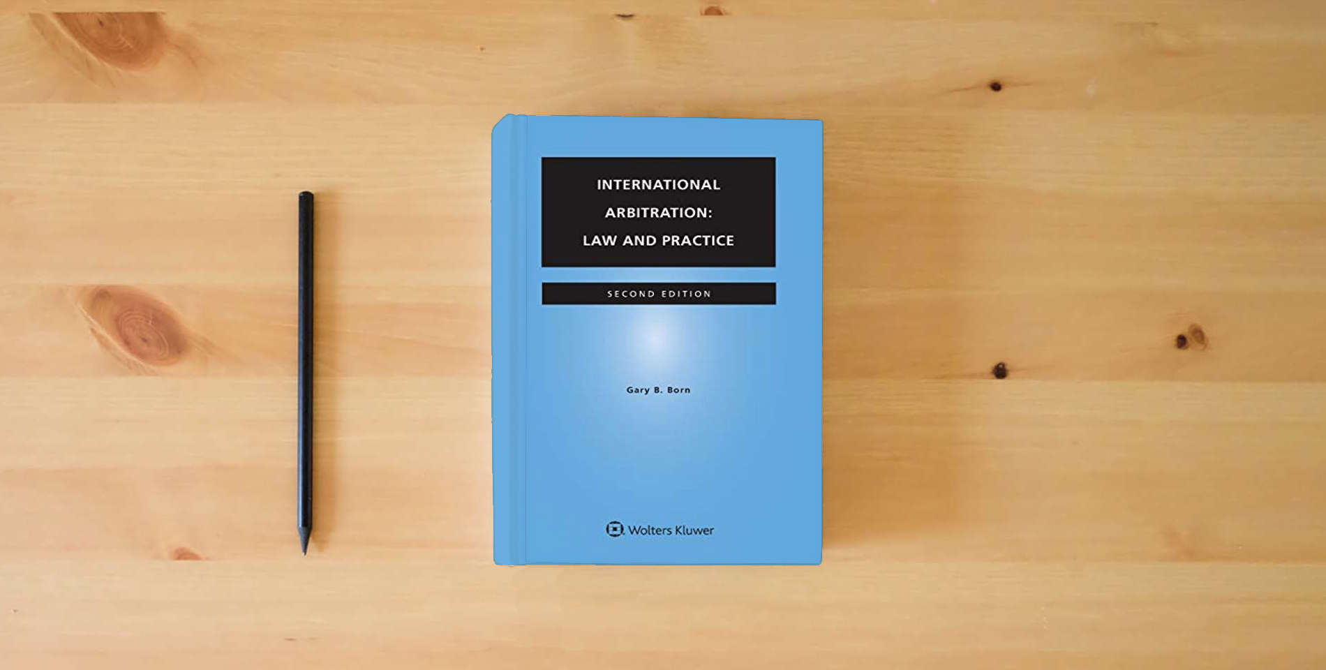 The book International Arbitration: Law and Practice is on the table