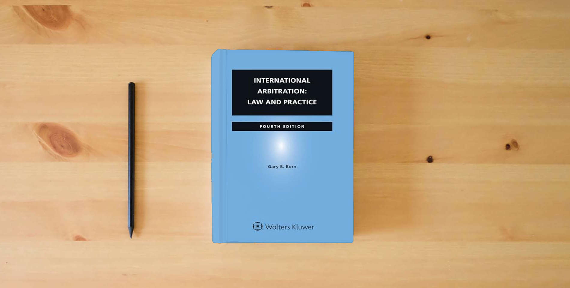 The book International Arbitration: Law and Practice is on the table