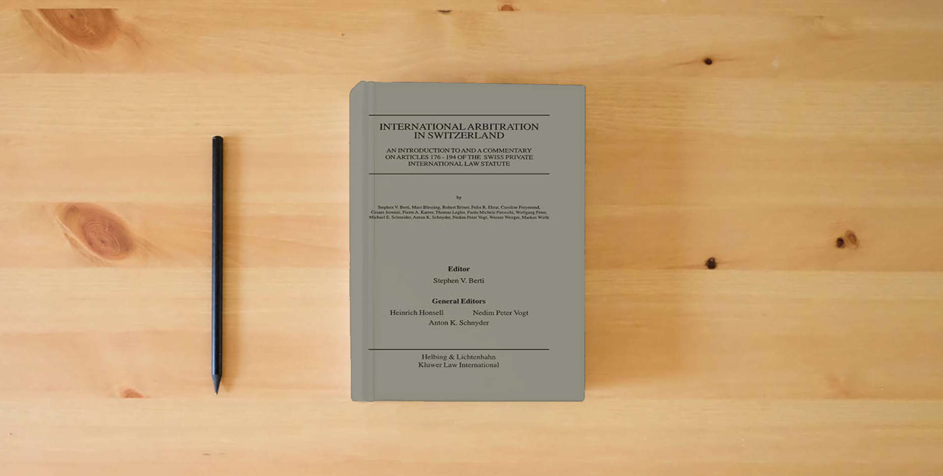 The book International Arbitration in Switzerland:An Introduction and Commentary on Articles 176-194 of the Swiss Private International Law Statute is on the table