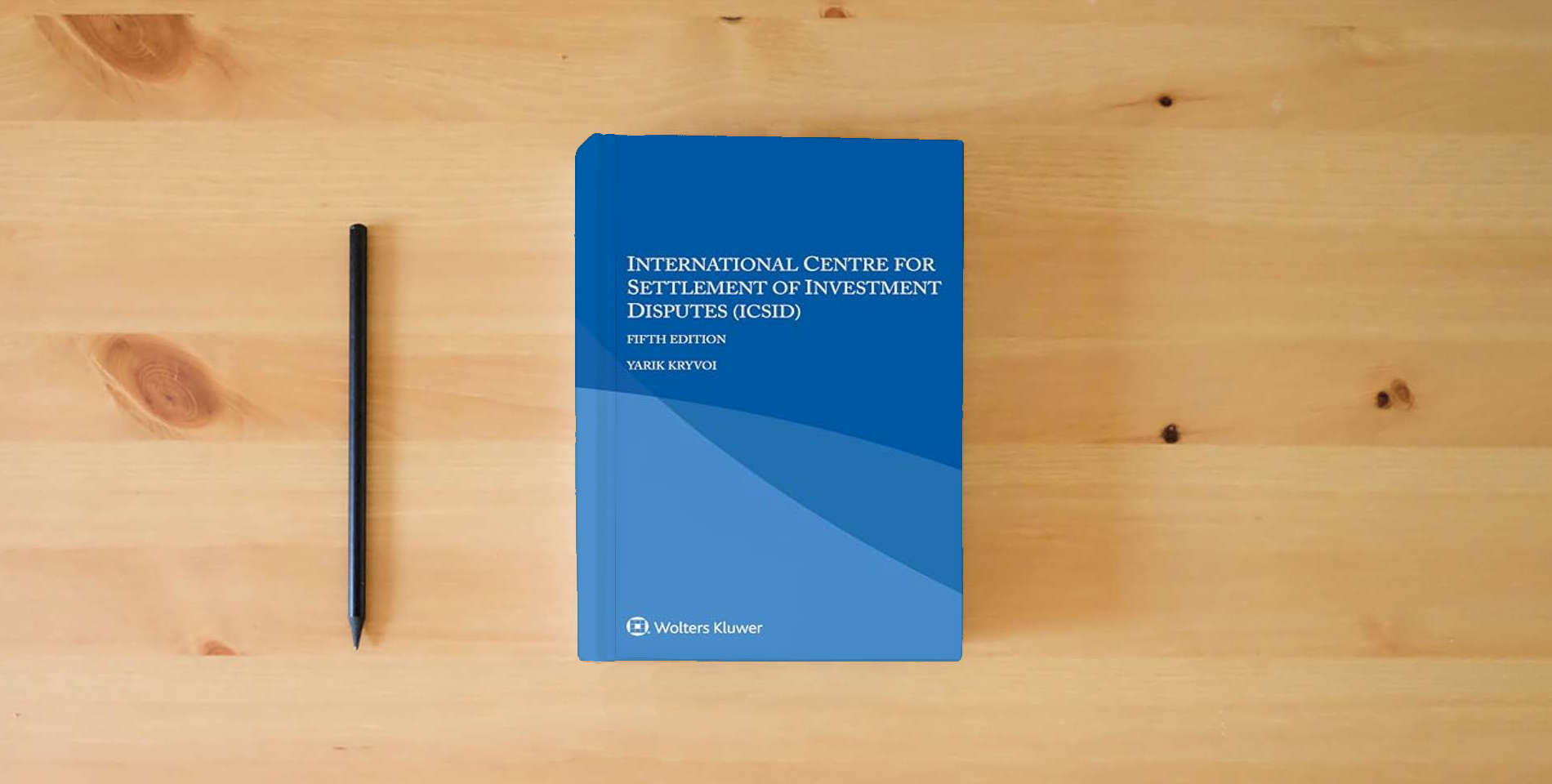 The book International Centre for Settlement of Investment Disputes (ICSID) is on the table