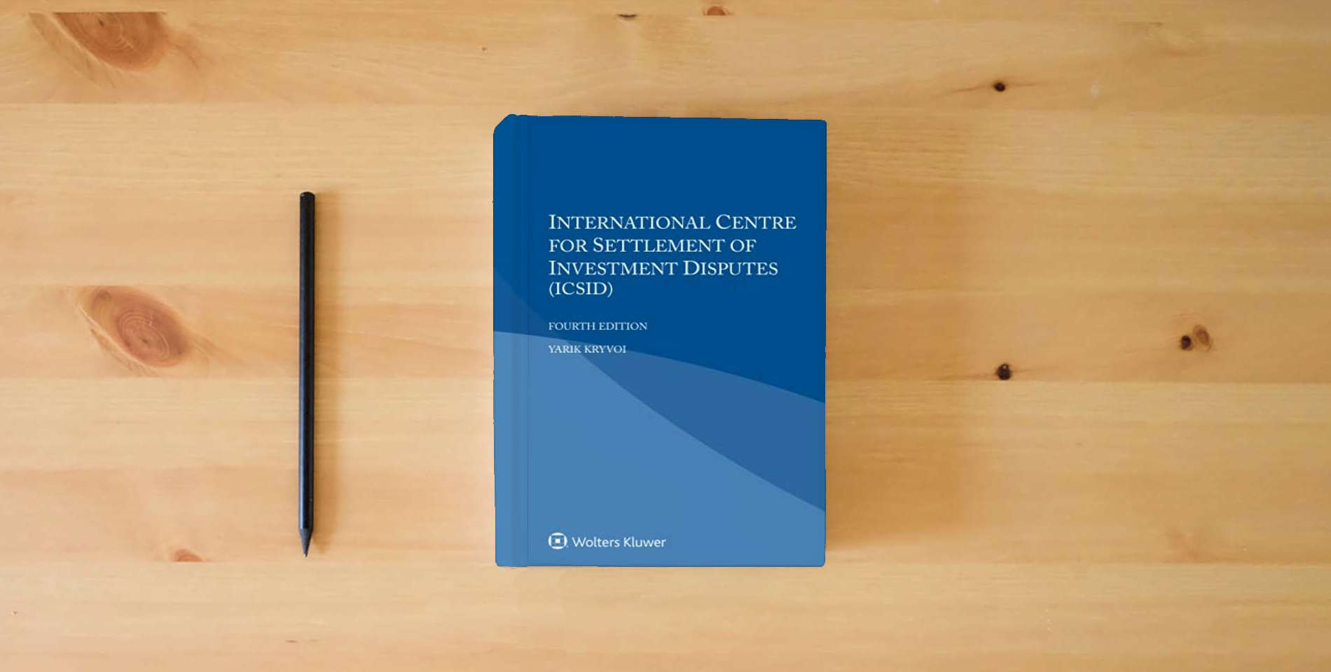 The book International Centre for Settlement of Investment Disputes (ICSID) is on the table