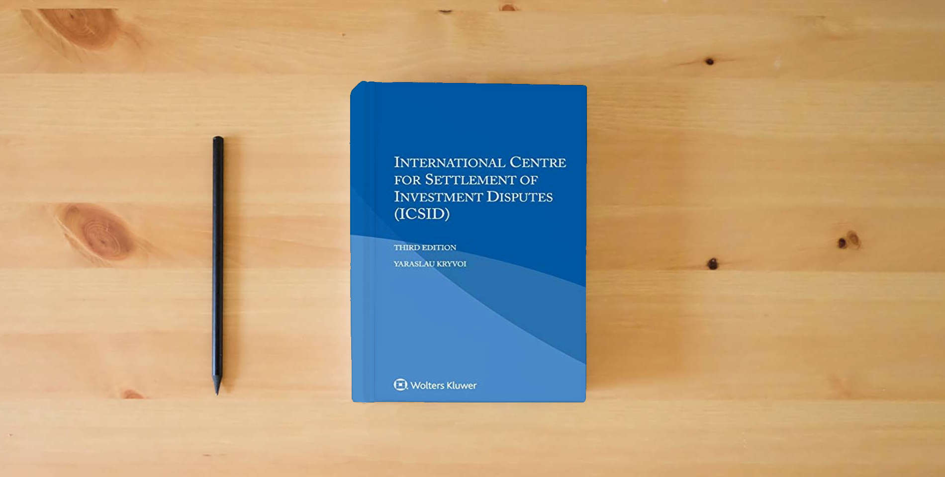The book International Centre for Settlement of Investment Disputes is on the table
